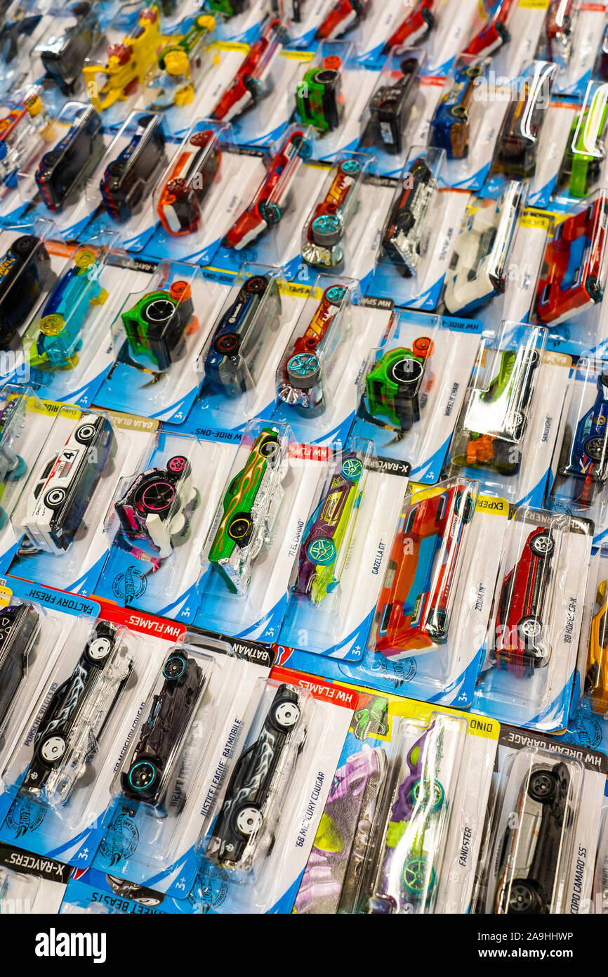 A huge collection of HotWheels, Hot wheels die cast miniature cars, trucks and lorries on display at The Entertainer toy store in the potteries Stock Photo