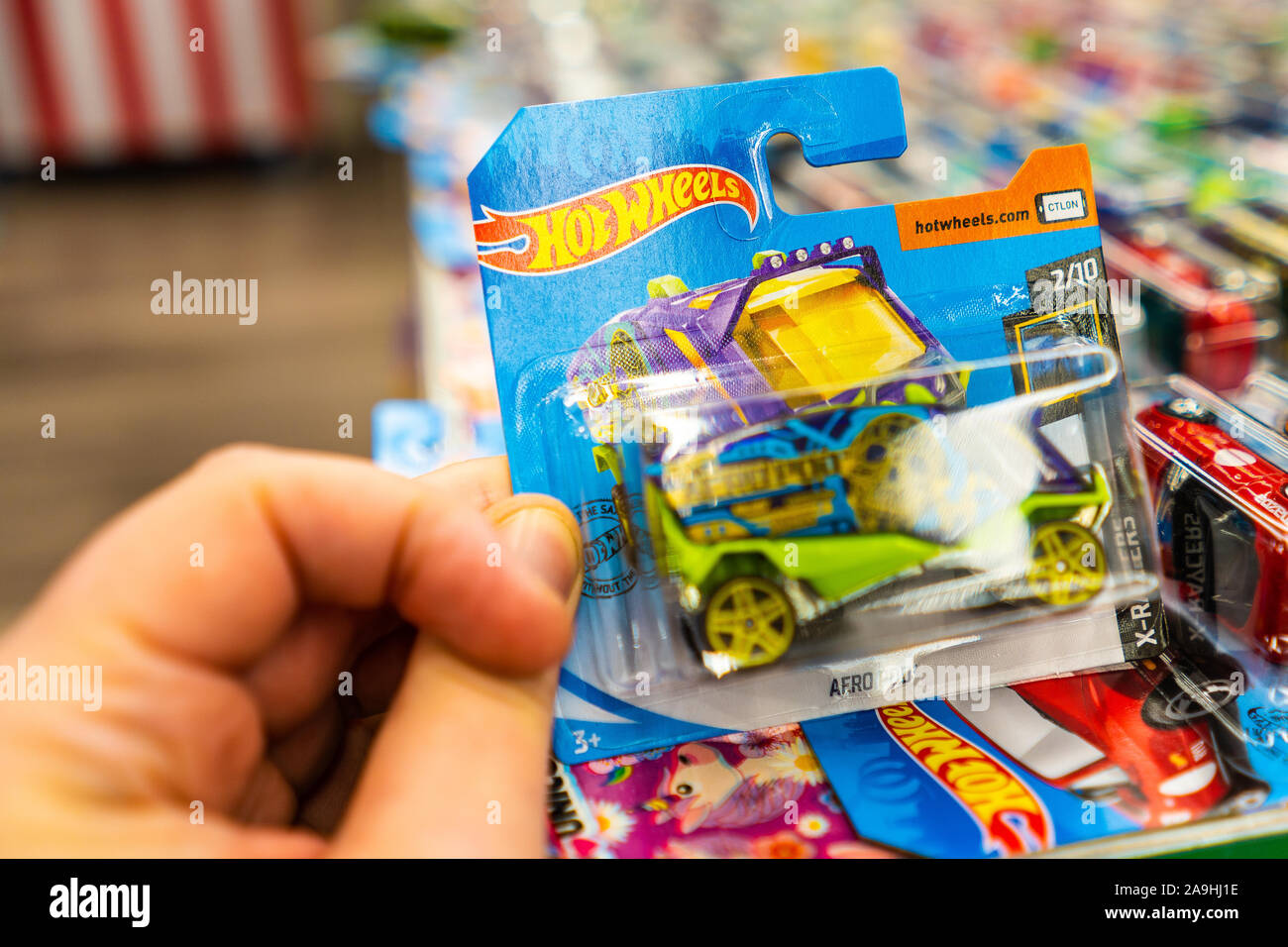 A huge collection of HotWheels, Hot wheels die cast miniature cars, trucks and lorries on display at The Entertainer toy store in the potteries Stock Photo