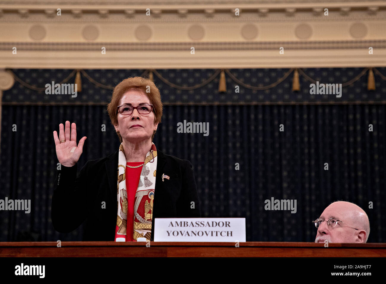 Washington, USA. 15th Nov 2019. Washington, DC, USA. 15th Nov, 2019. Marie Yovanovitch, former U.S. Ambassador to Ukraine, swears in to a House Intelligence Committee impeachment inquiry hearing in Washington, DC, U.S., on Friday, Nov. 15, 2019. Yovanovitch testified in private on October 11 that she was called back to Washington after a 'concerted campaign' by President Trump and his allies, including Rudy Giuliani, according to a transcript released later. Credit: Andrew Harrer/Pool via CNP | usage worldwide Credit: dpa/Alamy Live News Stock Photo