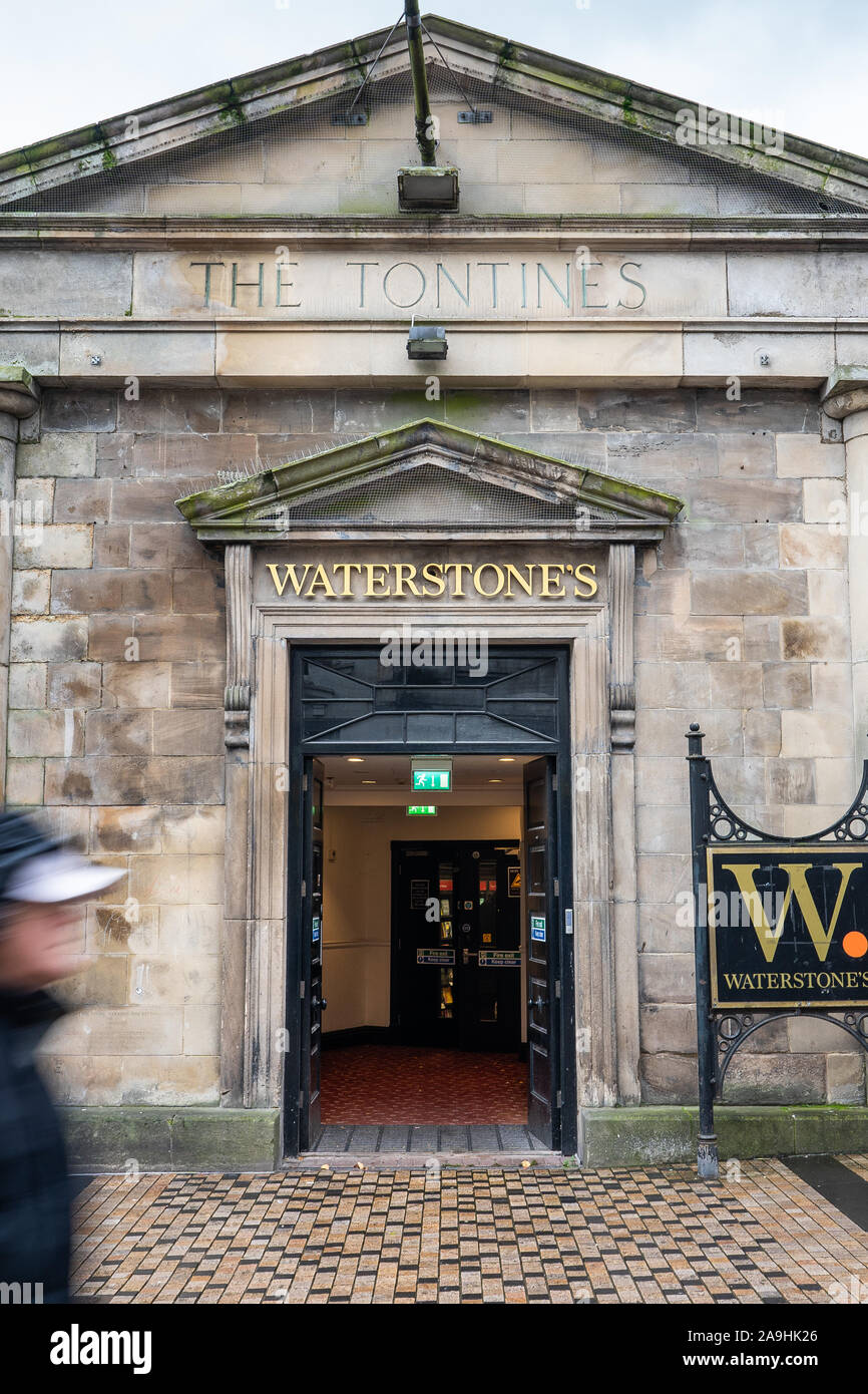 People, shoppers walk past Waterstones the mainstream and academic book retailer that encourages browsing, Waterstones Booksellers Ltd, Café W brand Stock Photo