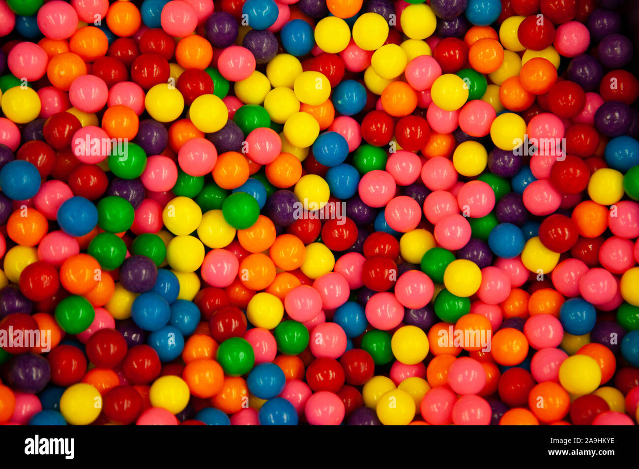 hard candy junk food in colorful sugar coated gum ball form Stock Photo