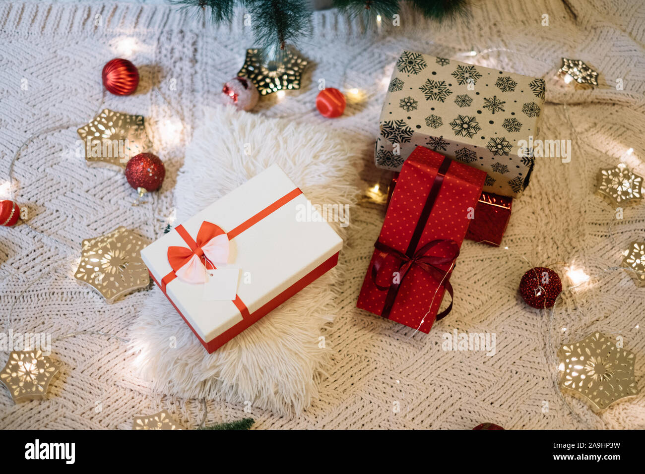 Christmas gift boxes with snowflake shaped lights Stock Photo - Alamy