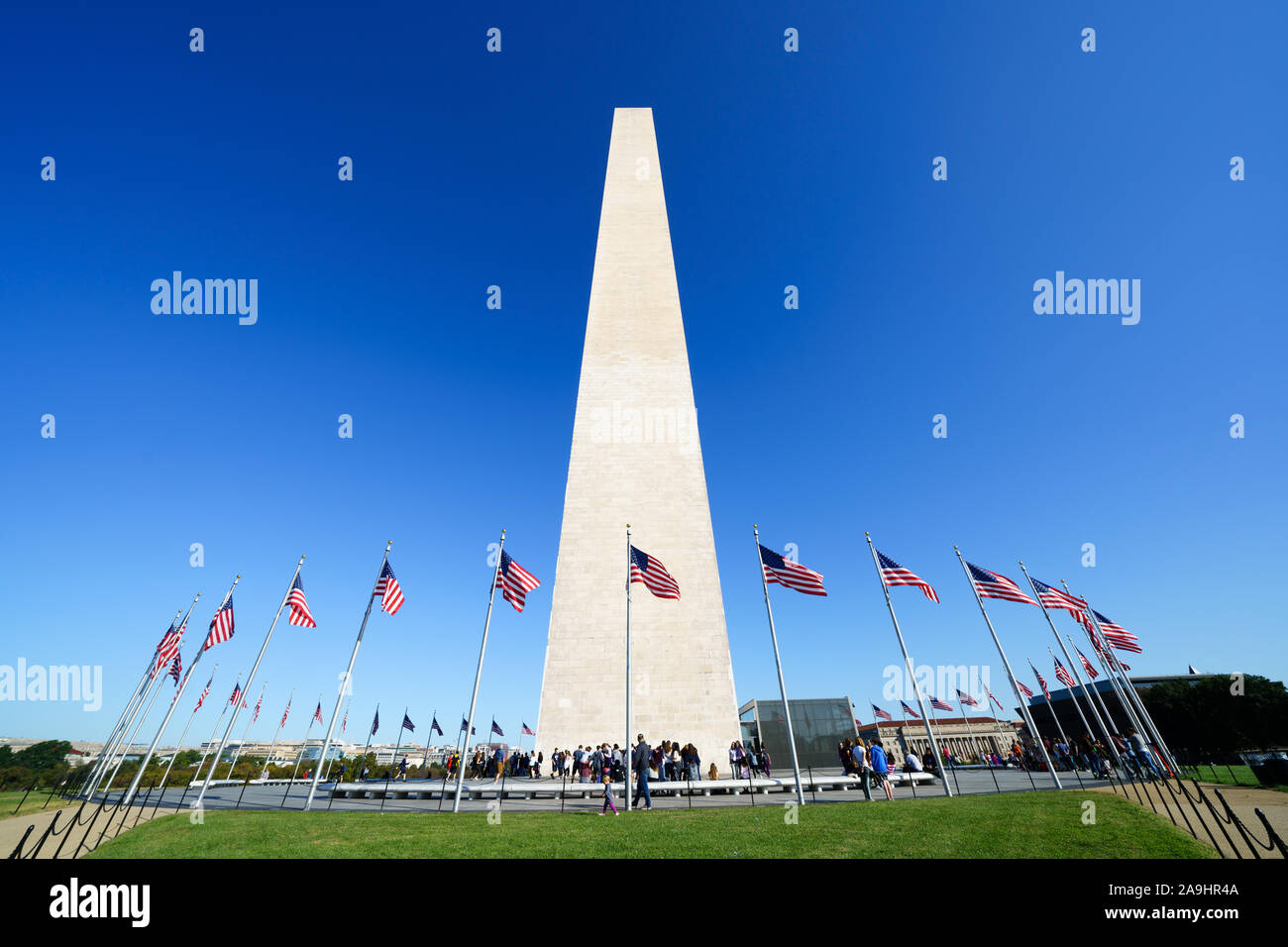 WASHINGTON, DC - The Washington Monument stands in the middle of the National Mall in Washington DC. It commemorates George Washington, the first President of the United States, and at nearly 555 feet (170 meters) tall is the tallest obelisk in the world. Stock Photo