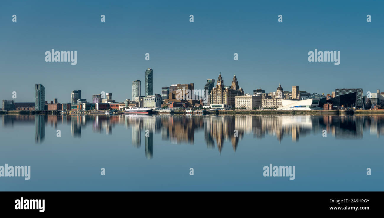 Panorama cityscape of Liverpool waterfront taken from Birkenhead with a simulated reflection Stock Photo