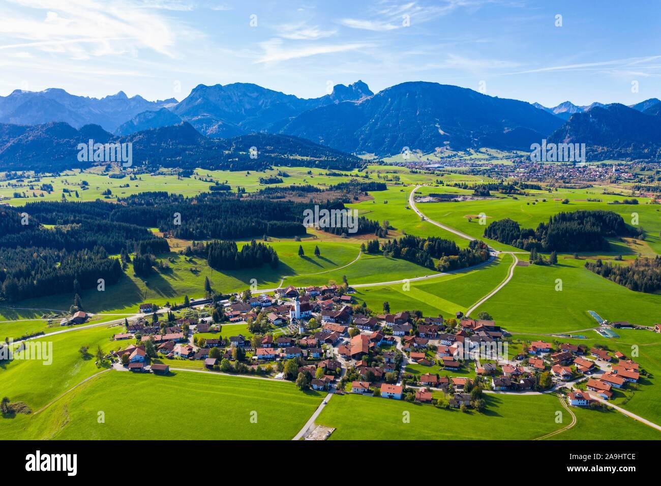 Zell bei Eisenberg, behind Breitenberg and Aggenstein, Allgau Alps, aerial view, Ostallgau, Allgau, Swabia, Bavaria, Germany Stock Photo