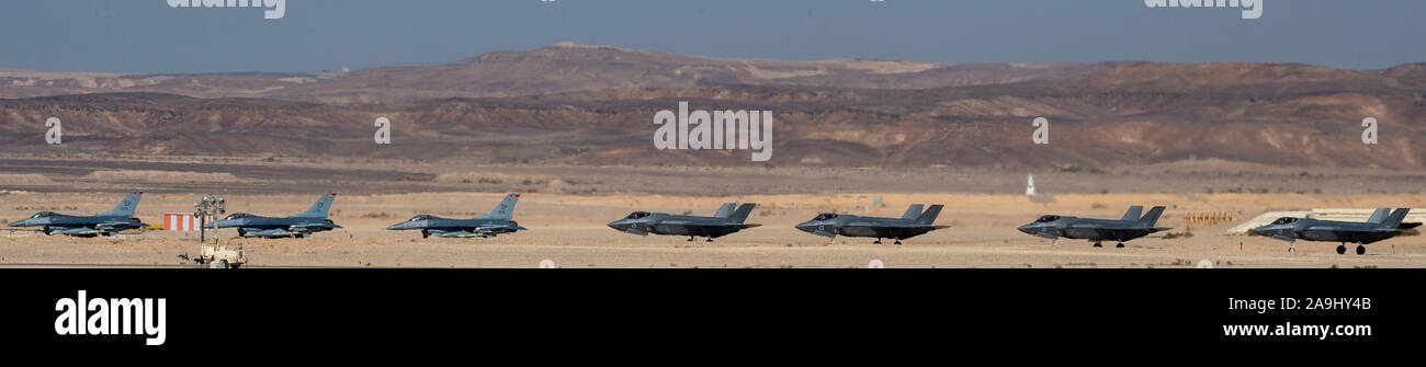 U.S. Air Force F-16 Fighting Falcons and Israeli air force F-35I Adirs, prepare to take off during exercise Blue Flag 2019 at Uvda Air Base, Israel, November 4, 2019. This year's Blue Flag exercise included integrating 4th and 5th generation aircraft to increase interoperability between platforms.  (U.S. Air Force photo by Airman 1st Class Kyle Cope) Stock Photo