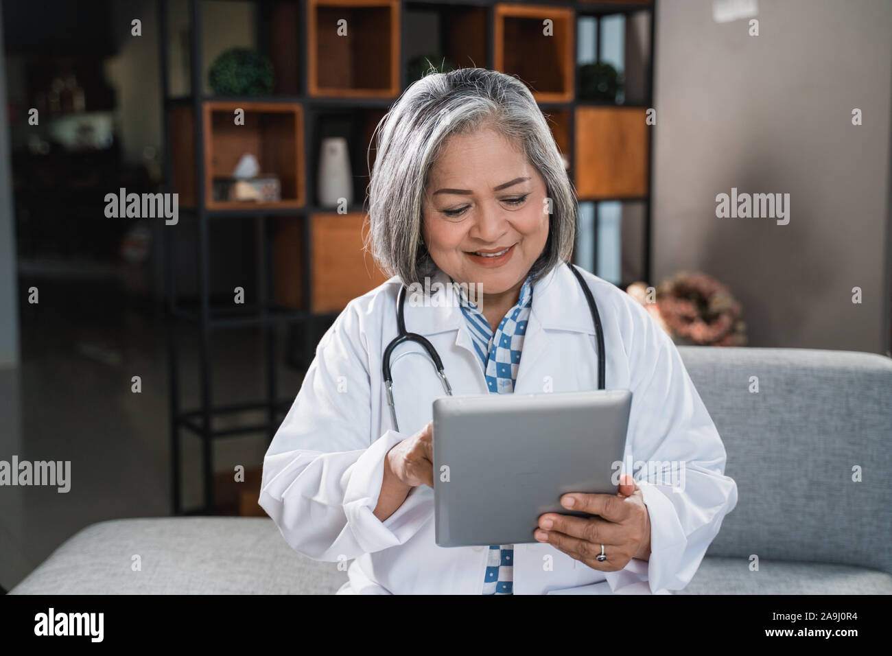 Asian female doctor using hi-res stock photography and images - Alamy