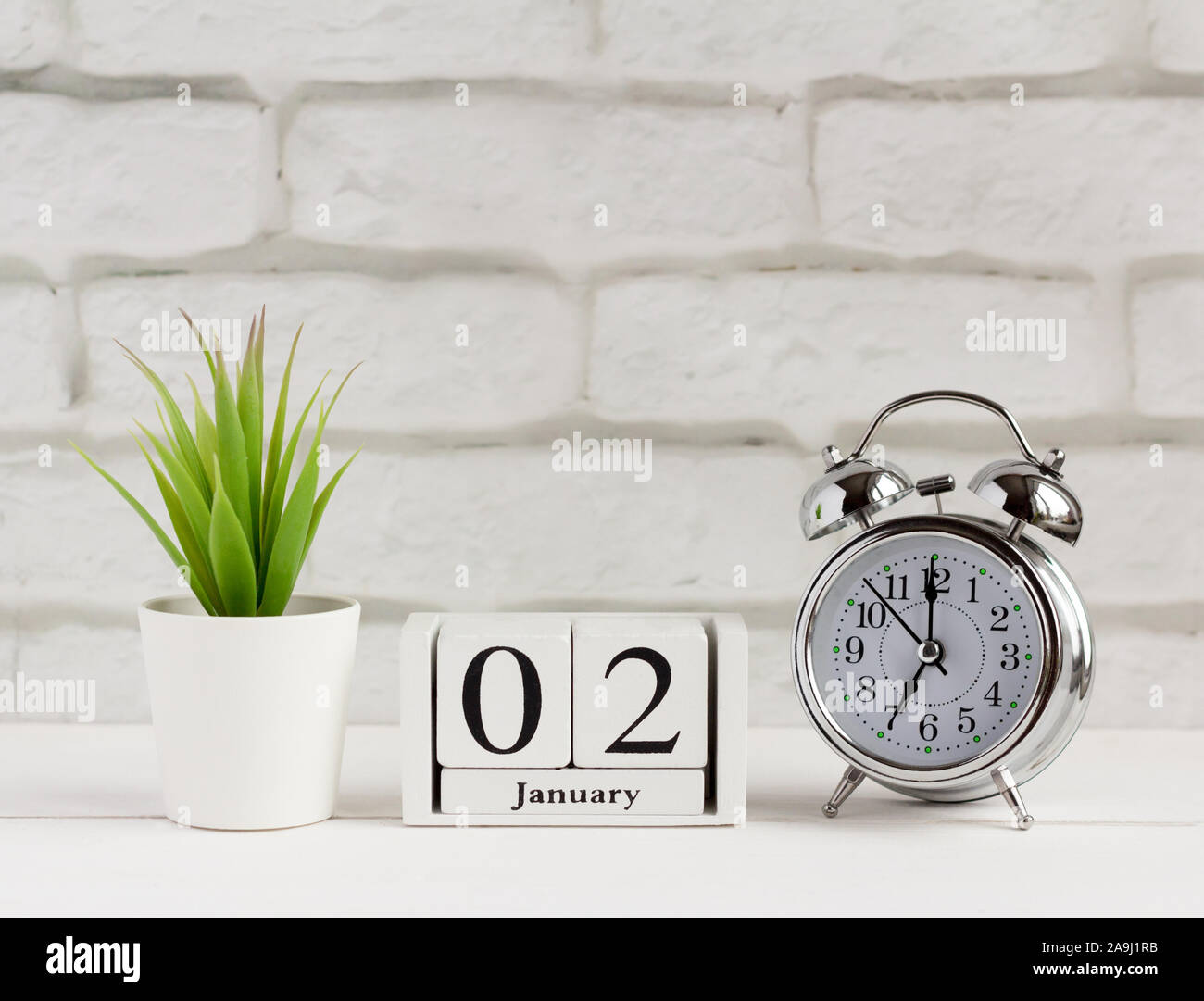 January 2 on the wooden calendar, the beginning of a new day and year Stock Photo