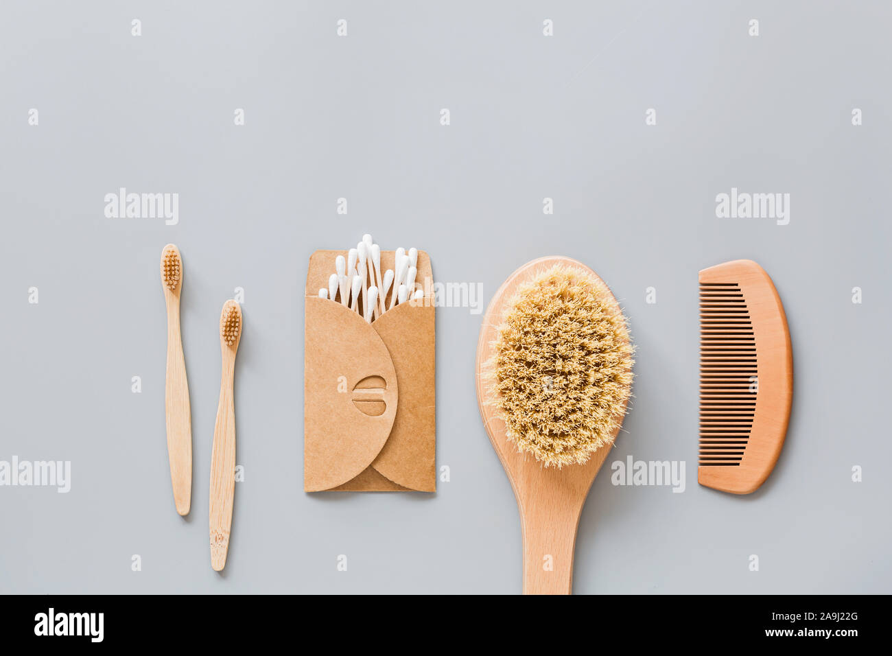 Download Natural Bathroom Accessories Wooden Comb Bamboo Toothbrush Massage Brush Ear Sticks On Gray Paper Background Zero Waste Products Mockup Flat Stock Photo Alamy