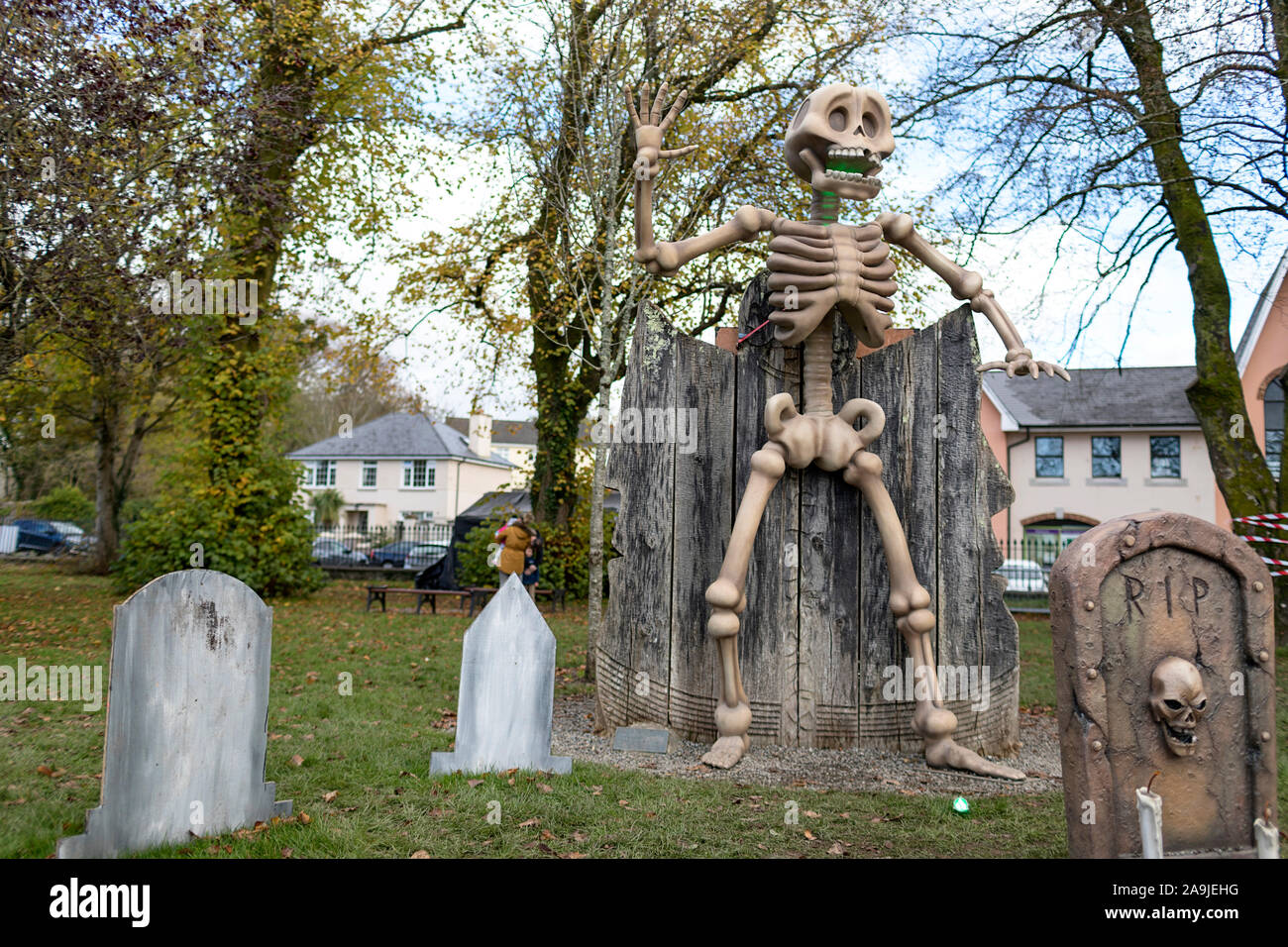 Scary Halloween figures and decorations in a small public park in