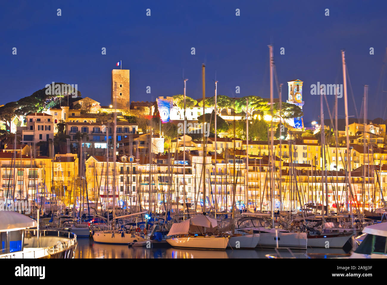 Cannes. Old town of Cannes and sailing harbor evening view, French