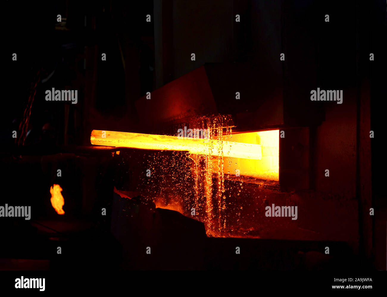 Steel quenching at high temperature in industrial furnace at the