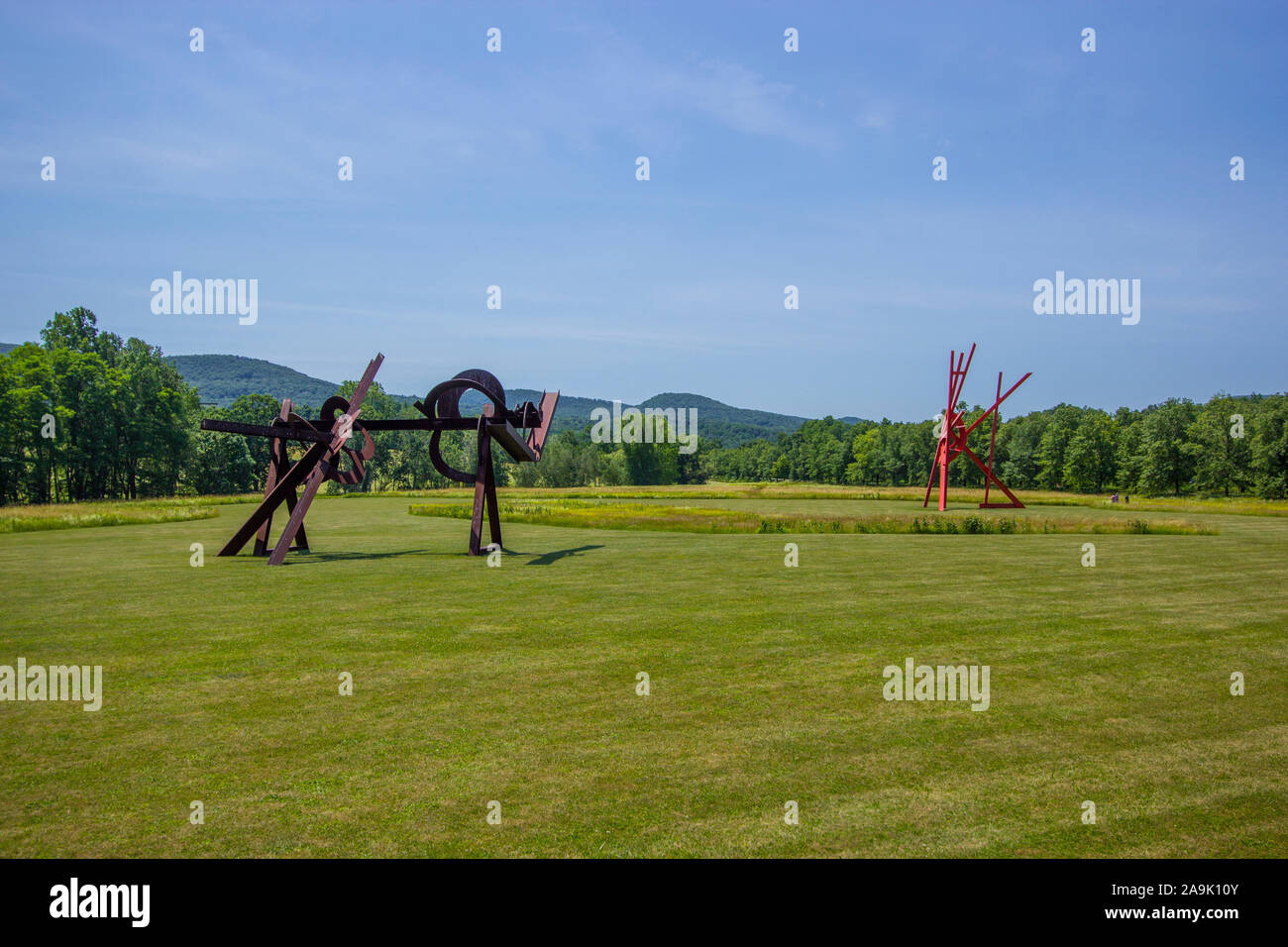 Two large steel sculptures by Mark di Suvero. On the lawn at Storm King