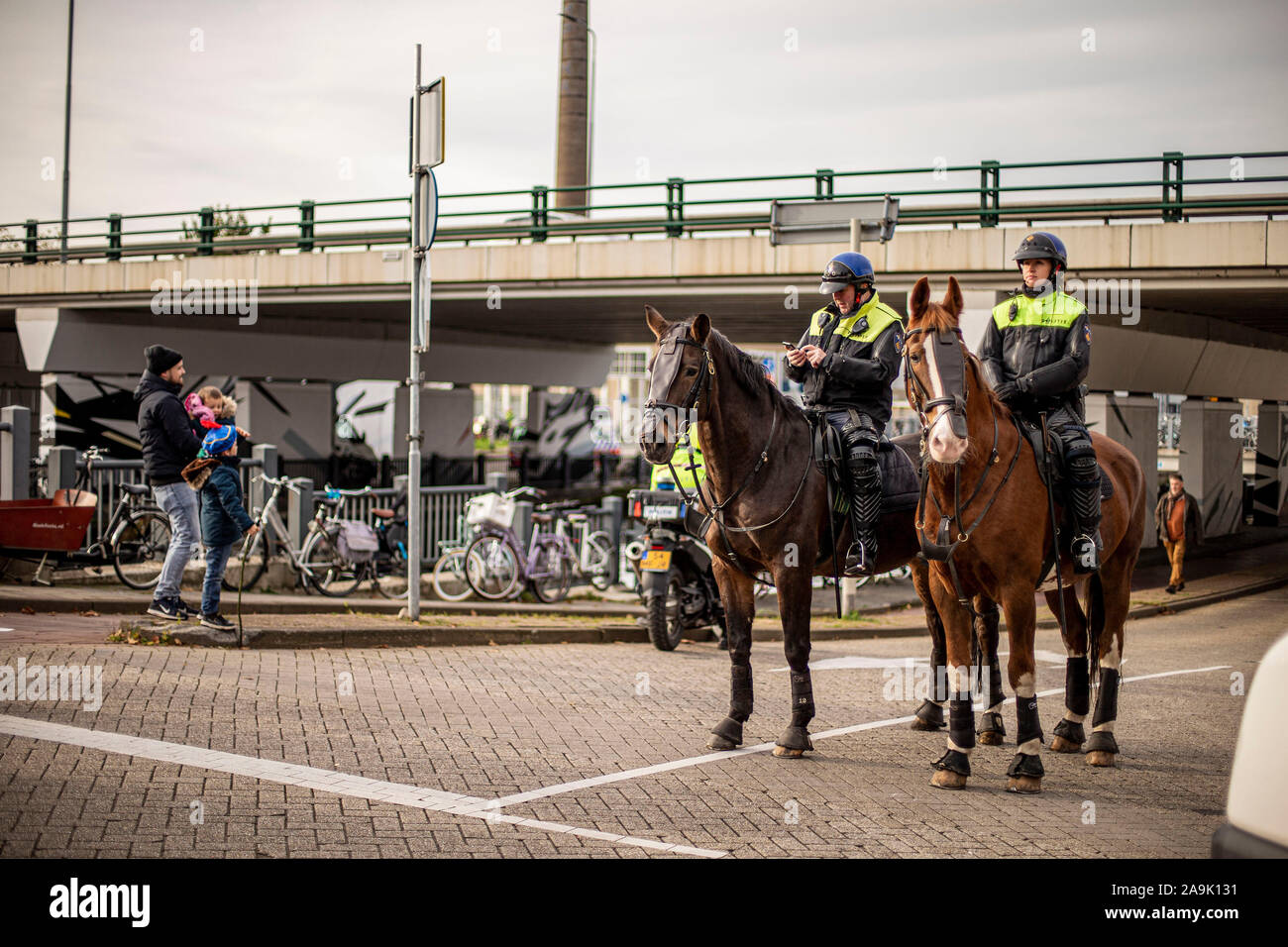 Eindhoven, Netherlands. 16th Nov, 2019. EINDHOVEN, 16-11-2019, Sinterklaas in Eindhoven. Policemen on horse. Credit: Pro Shots/Alamy Live News Stock Photo