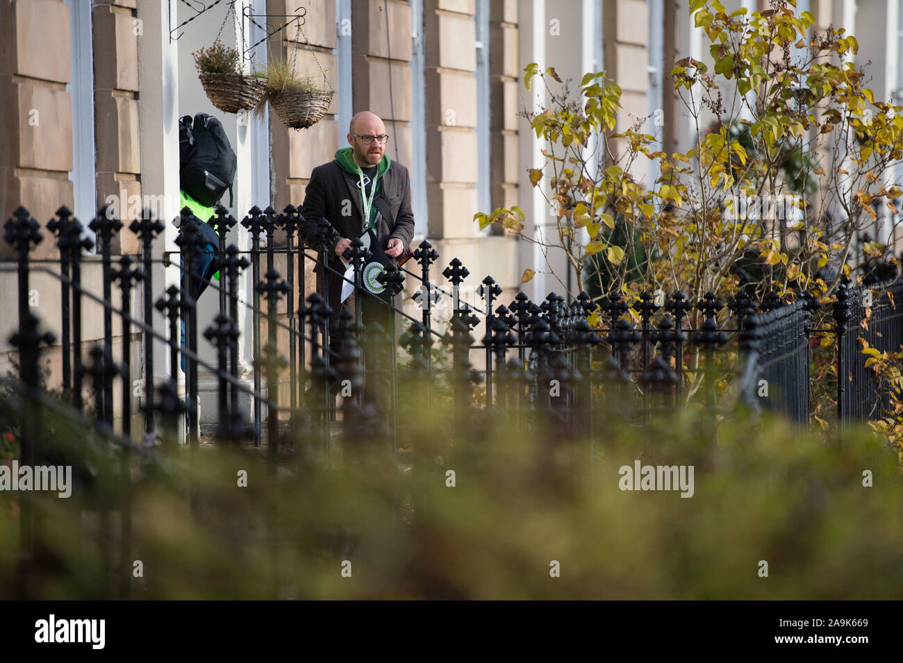 Glasgow, UK. 16th Nov, 2019. Pictured: Patrick Harvie MSP - Co Leader of the Scottish Green Party. Photo op for the Scottish Green Party on the General Election Campaign Trail. Patrick joins party activists to go round the neighbourhood door knocking and having conversations with the local residents. Credit: Colin Fisher/Alamy Live News Stock Photo