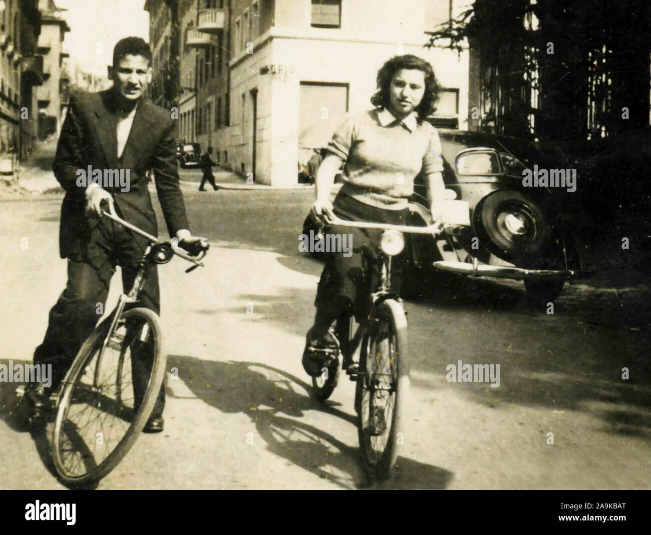 Couple cycling, Italy Stock Photo