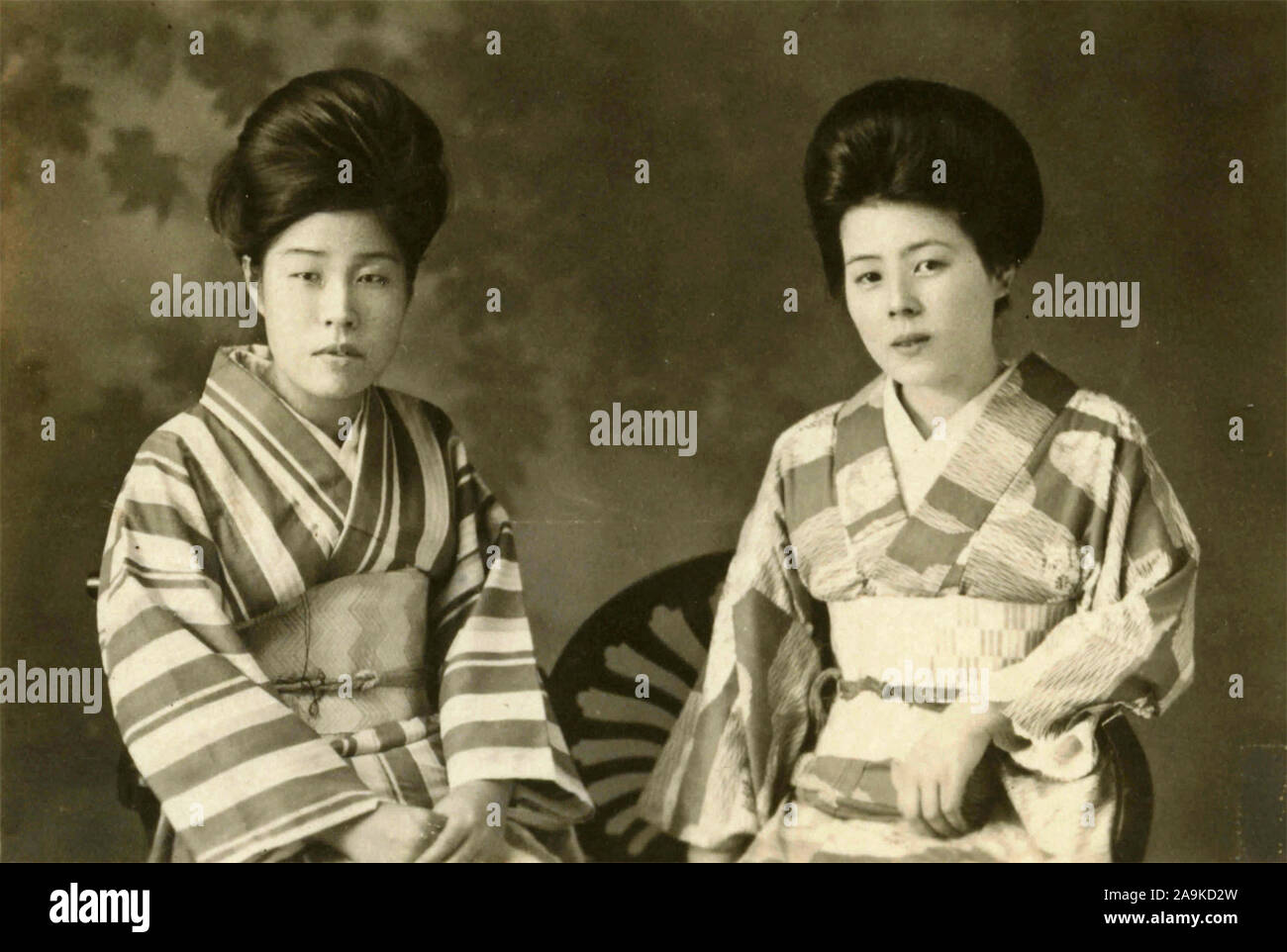 Portrait of two Japanese girls in kimonos Stock Photo