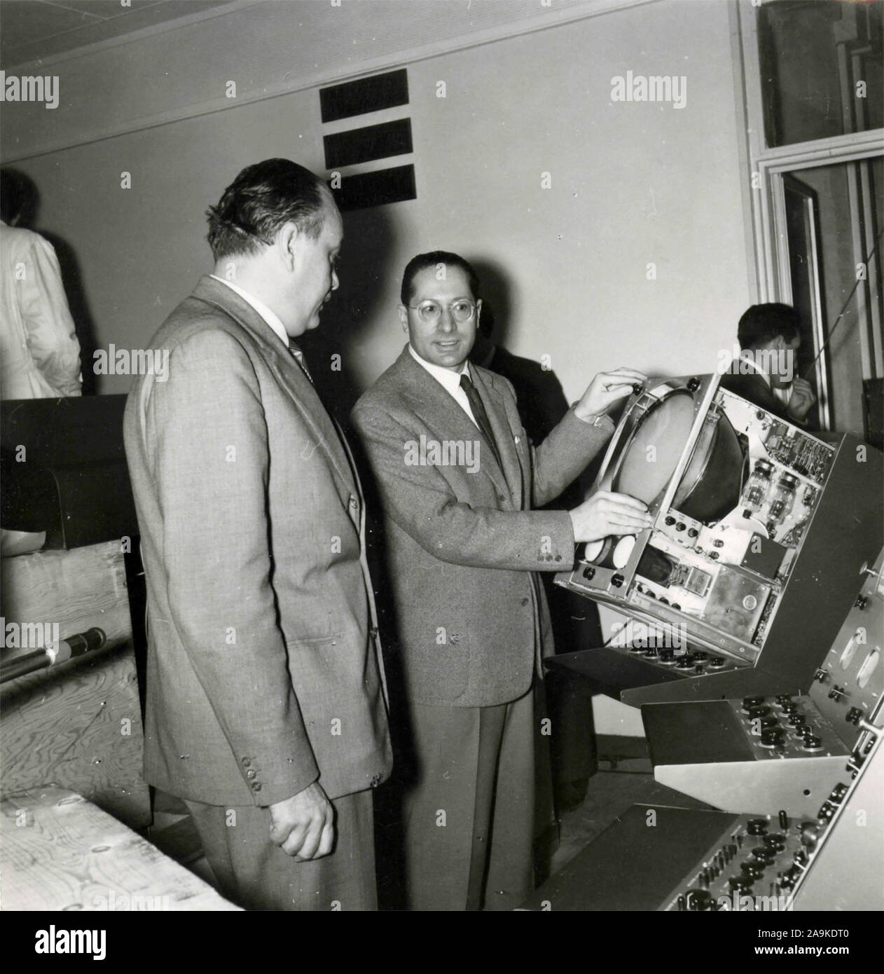 The founder of the RAI Sergio Pugliese examines a monitor for the telecast, Italy Stock Photo
