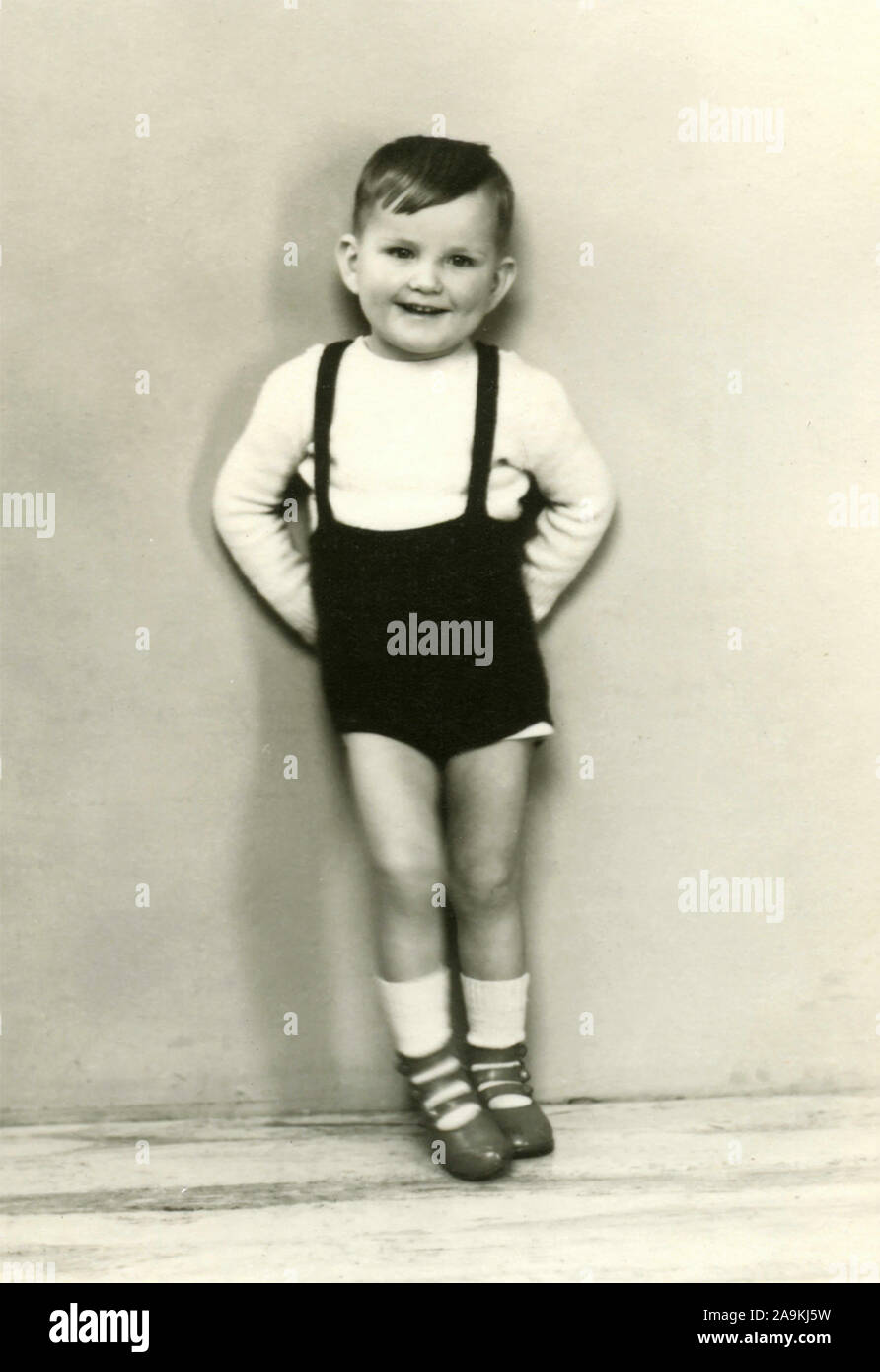 A child smiles in shorts Stock Photo