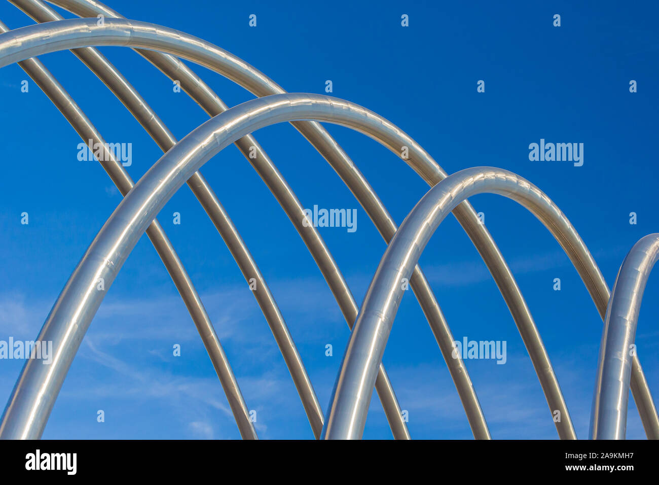 Abstract steel pipes rising into the sky Stock Photo