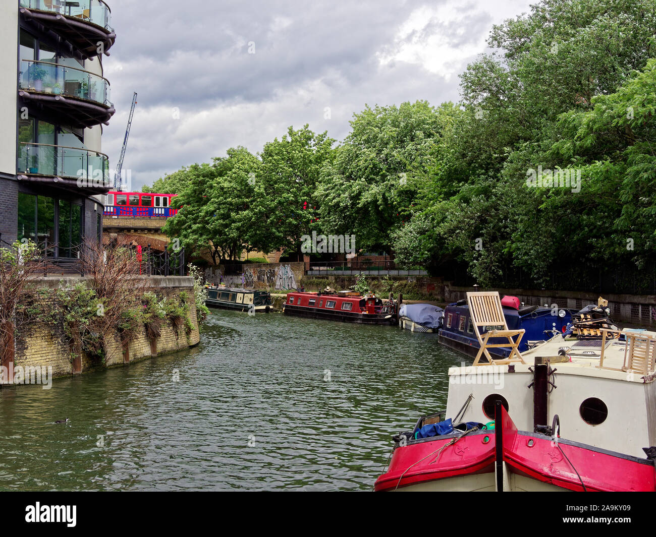 Limehouse Cut canal in Limehouse, London, UK. Pleasure boats moored ...