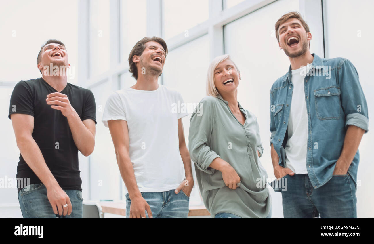 group of successful young people standing in the office Stock Photo - Alamy