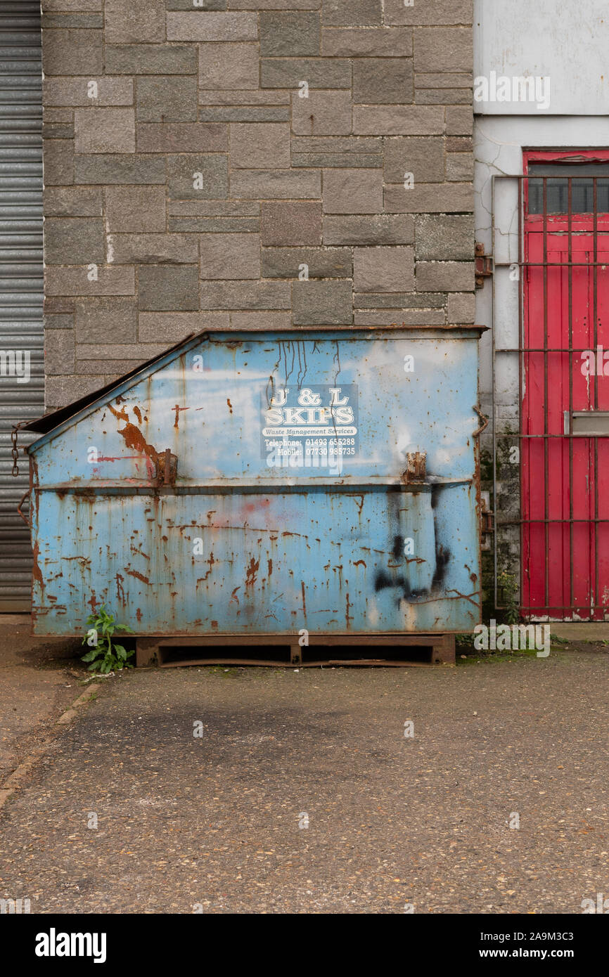 Rusty skip outside industrial unit, Riverside Road, Gorleston, Norfolk ...
