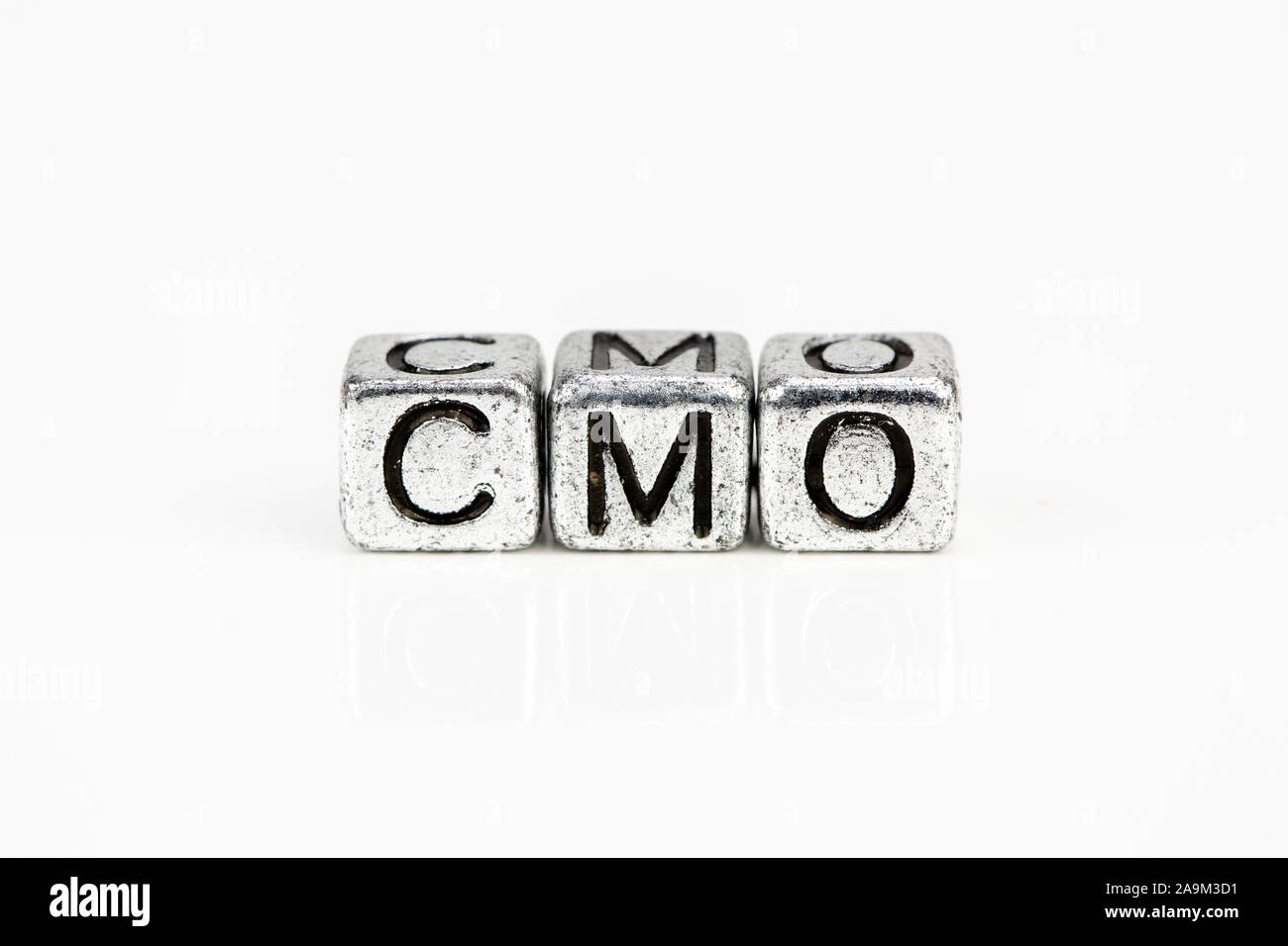 Chief Marketing Officer CMO concept with cubic metal letters on white background Stock Photo