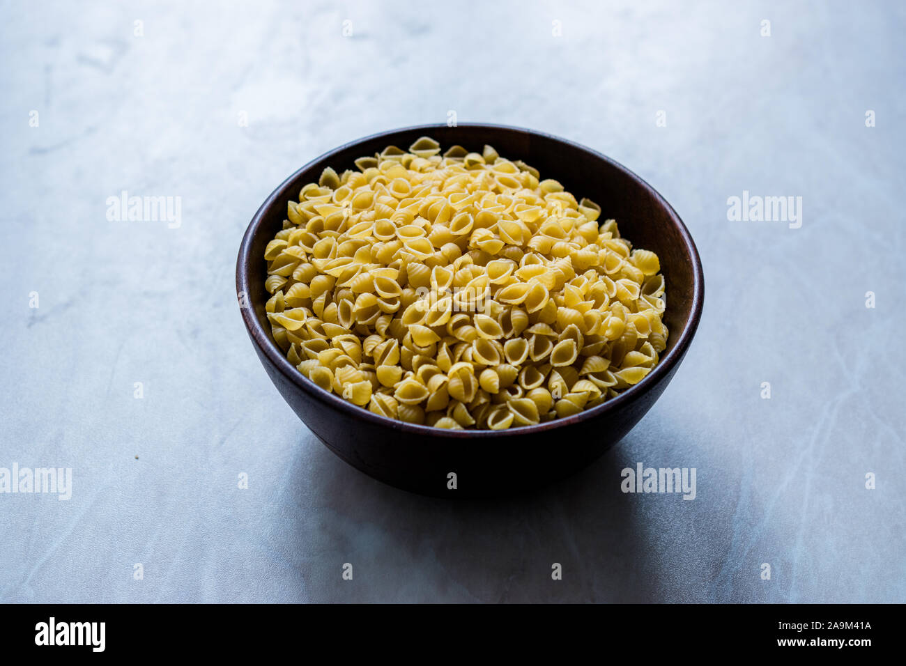 Italian Raw Pasta Shells Conchiglie / Conchiglioni in Wooden Bowl ...