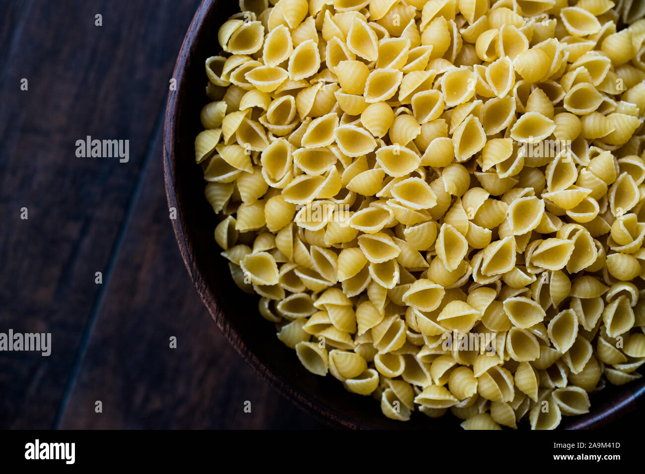 Italian Raw Pasta Shells Conchiglie / Conchiglioni in Wooden Bowl ...