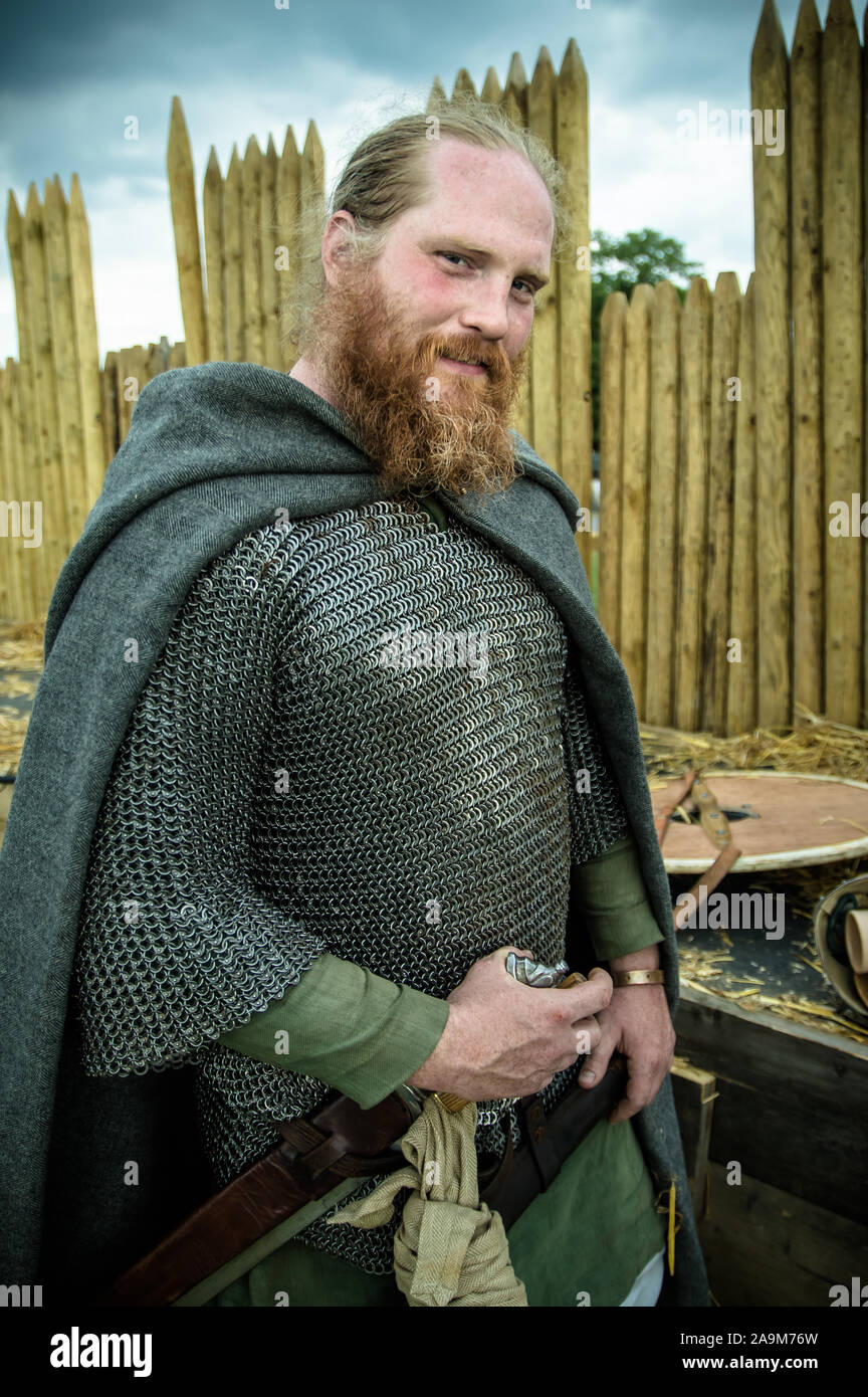 Saxon warrior in chain mail during reenactment event Military Odyssey Stock Photo