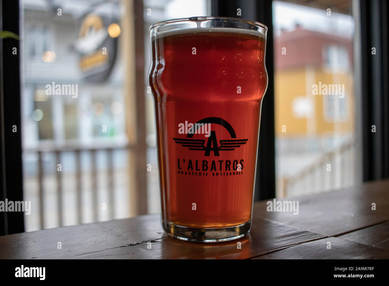 Mascouche, Lanaudière, Québec, Canada- November 10, 2019: Pint of beer at L'Albatros Brasserie artisanale, Craft Brewery Stock Photo