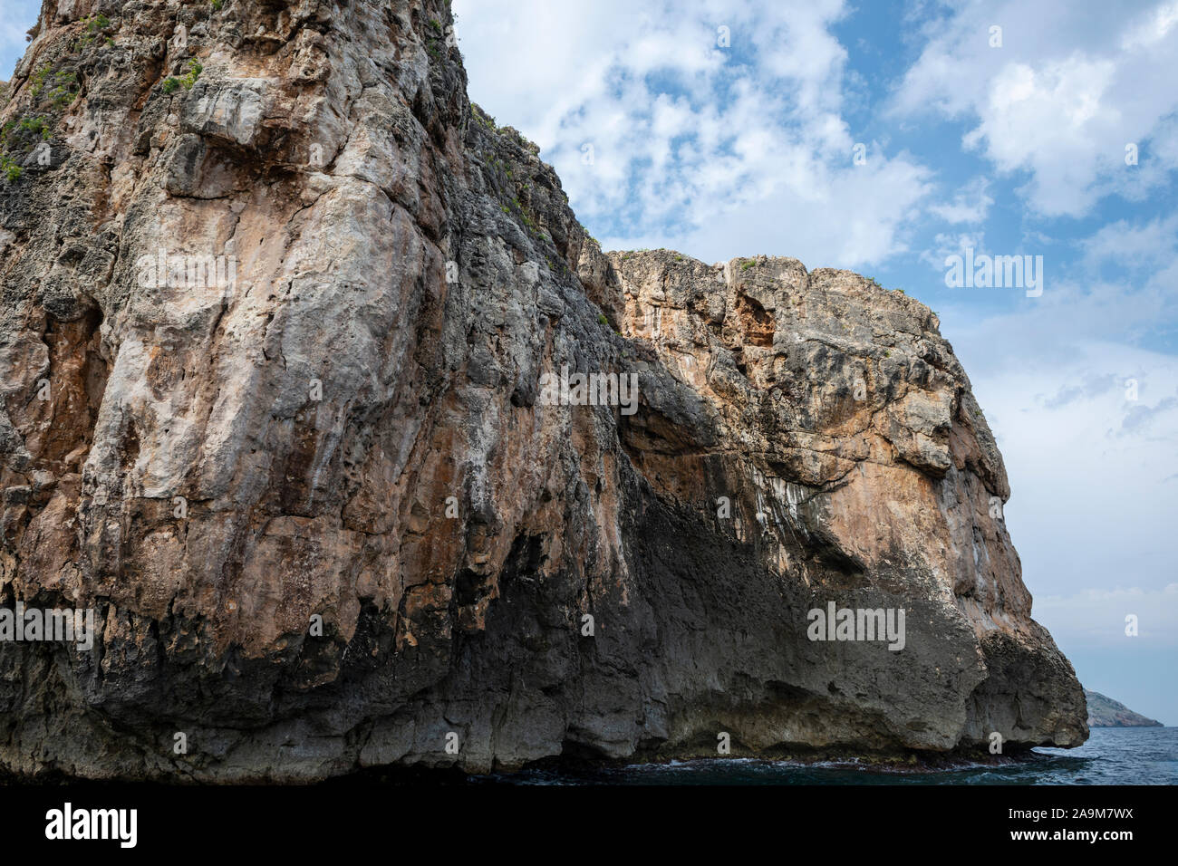 Sea cliffs and caves view from sea at Santa Maria di Leuca in Apulia (Puglia) in Southern Italy Stock Photo