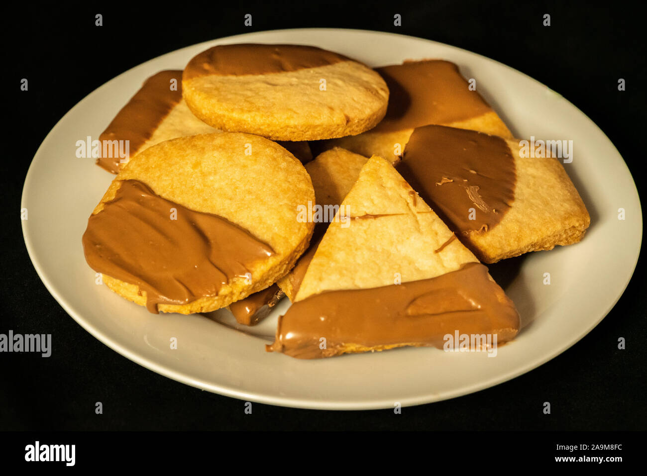 Delicious shortbread cookies with a chocolate drizzle Stock Photo Alamy