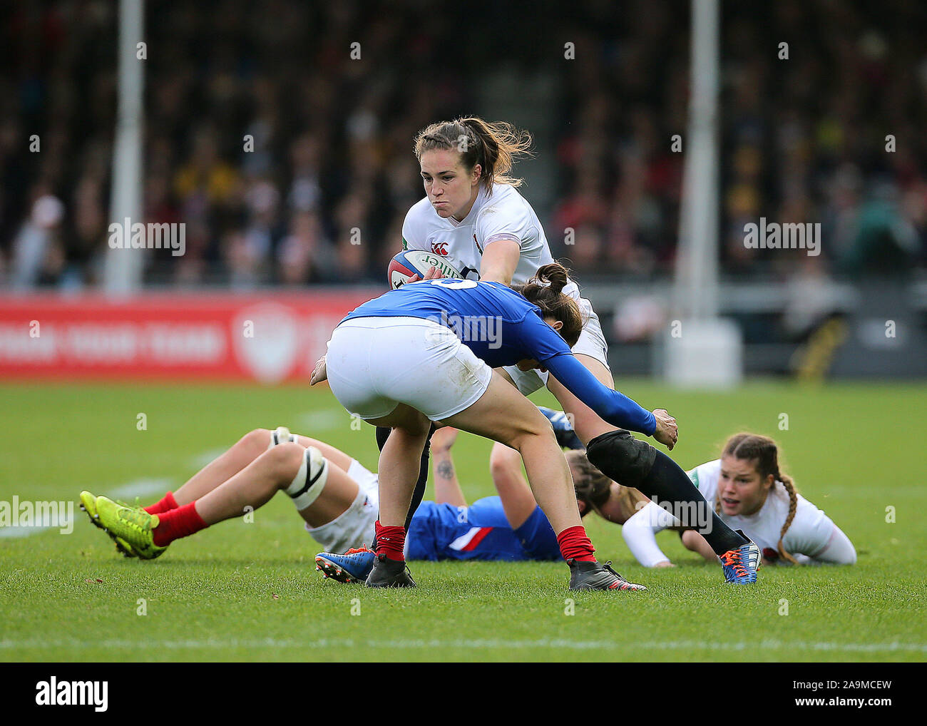 England's Emily Scarratt is tackled by France's Jessy Tremouliere during the Women's International match at Sandy Park, Exeter. Stock Photo