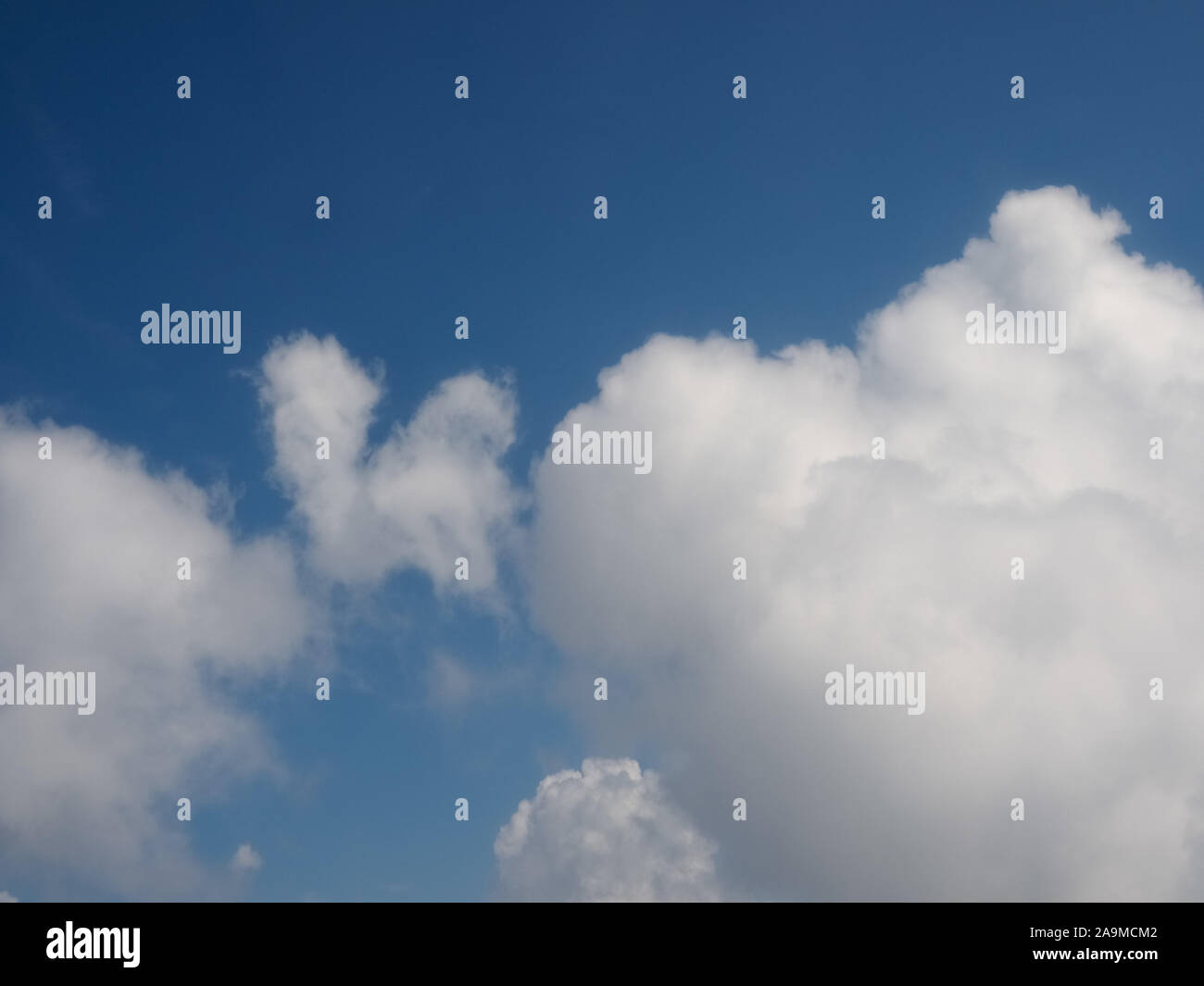 blue sky with clouds seen from plane useful as a background Stock Photo ...