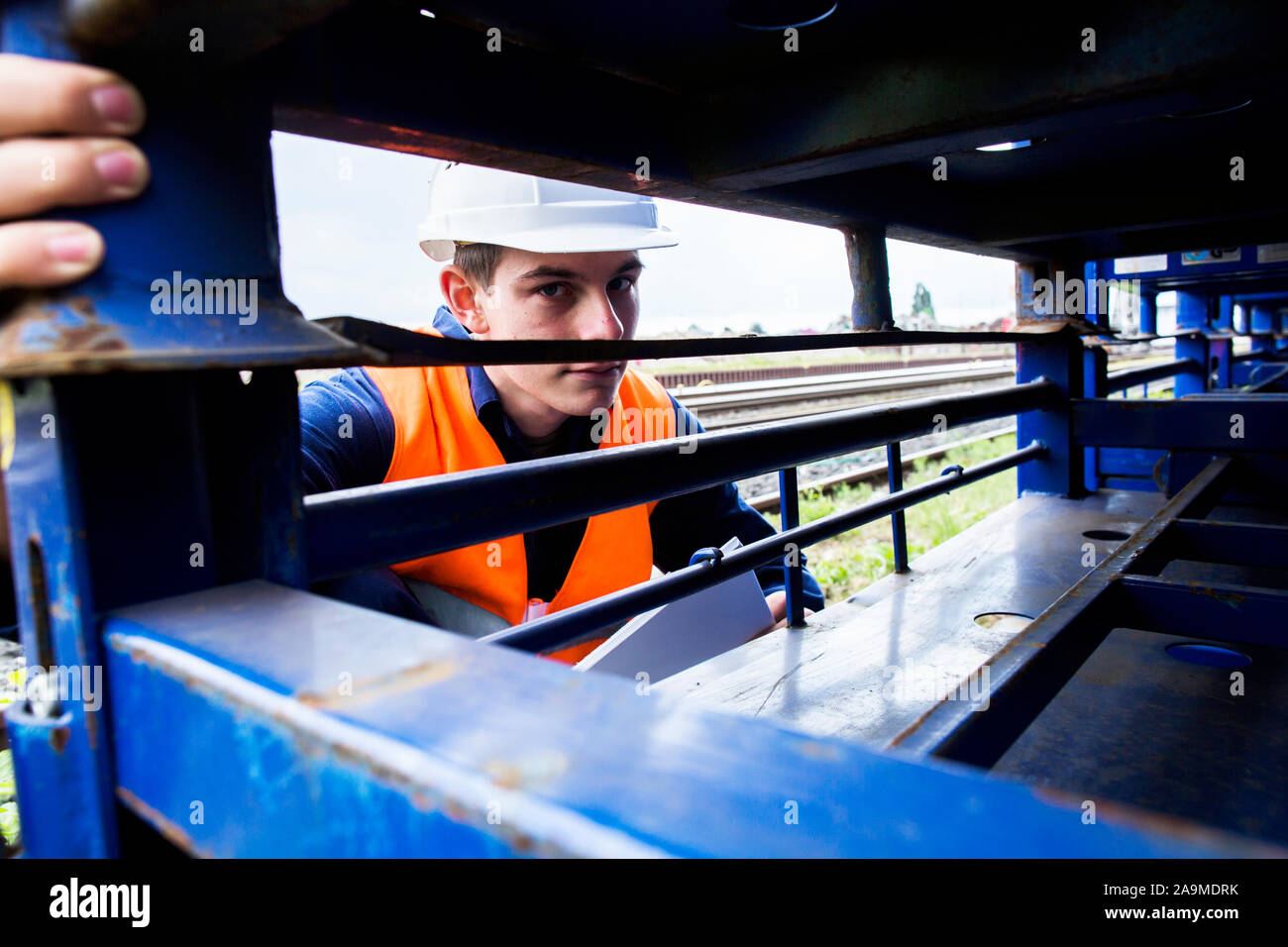 worker young male watching Stock Photo