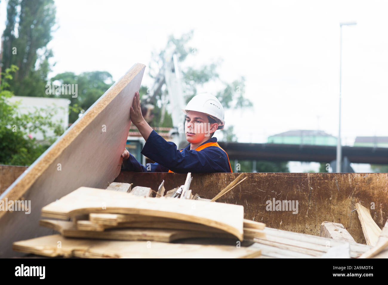 worker young male throwing Stock Photo
