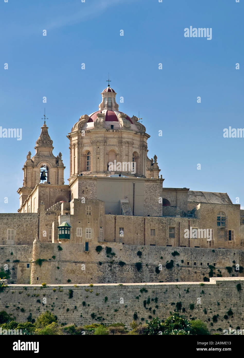 The dome of the medieval cathedral overlooking the bastions of the old city of Malta, Mdina. Stock Photo