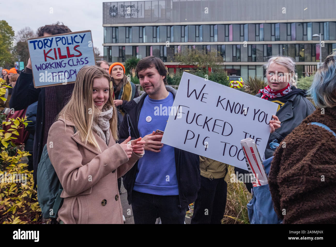 London, UK. 16th November 2019. Protesters from FCKBoris at Brunel University in Uxbridge  urge everyone to register and vote against Boris Johnson and kick him out for his racist, elitist politics.  Johnson had a majority of just over 5 thousand in 2017 and Labour candidate Ali Milani has strong hopes of beating him and the other 10 candidates. Peter Marshall/Alamy Live News Stock Photo