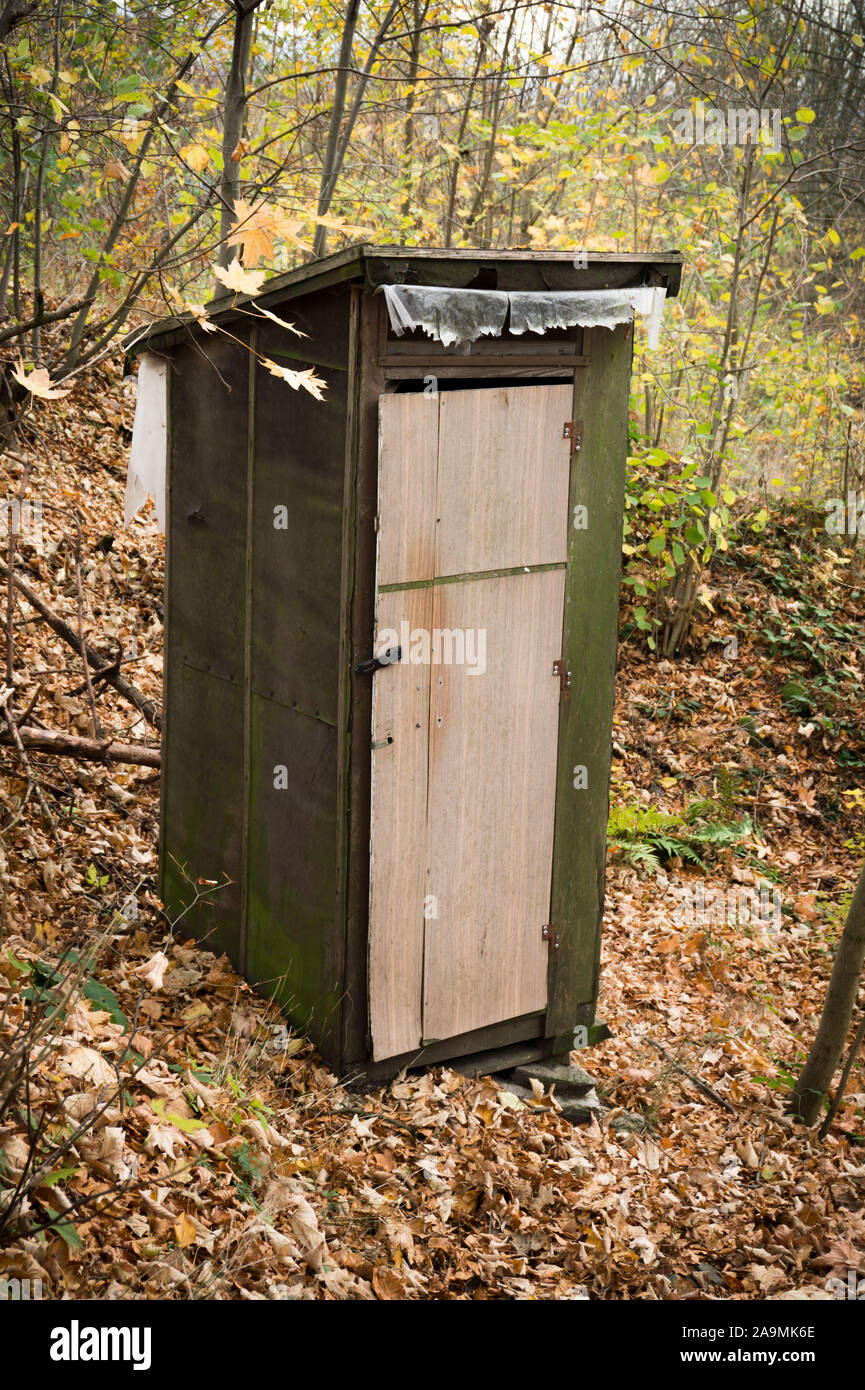 Old wooden toilet in the forest. Dry toilet in the forest. Abandoned wc  booth Stock Photo - Alamy