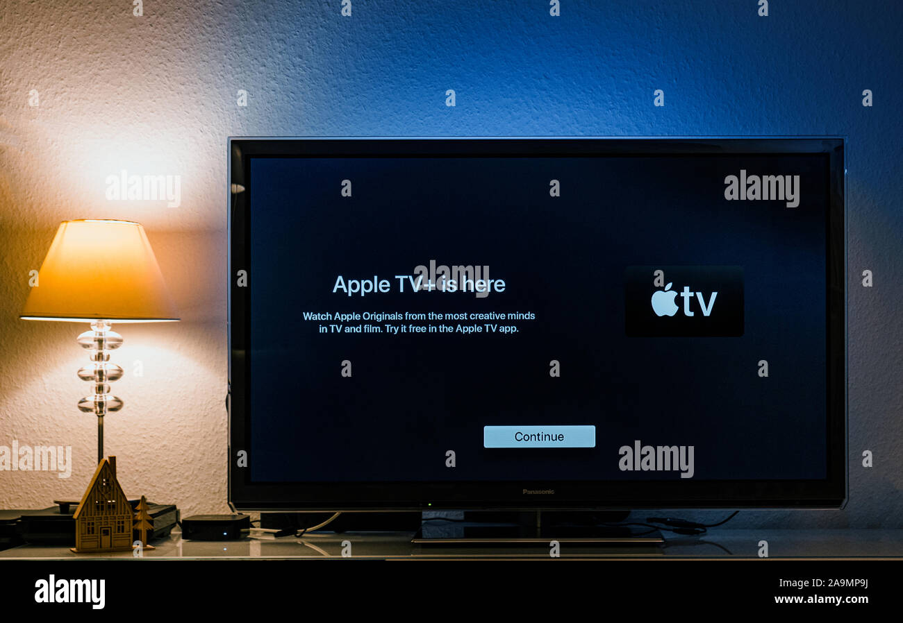 Paris, France - Nov 1, 2019: Apple TV is here message on living room display with try for free continue button launch first day over-the-top ad-free subscription video on demand web
