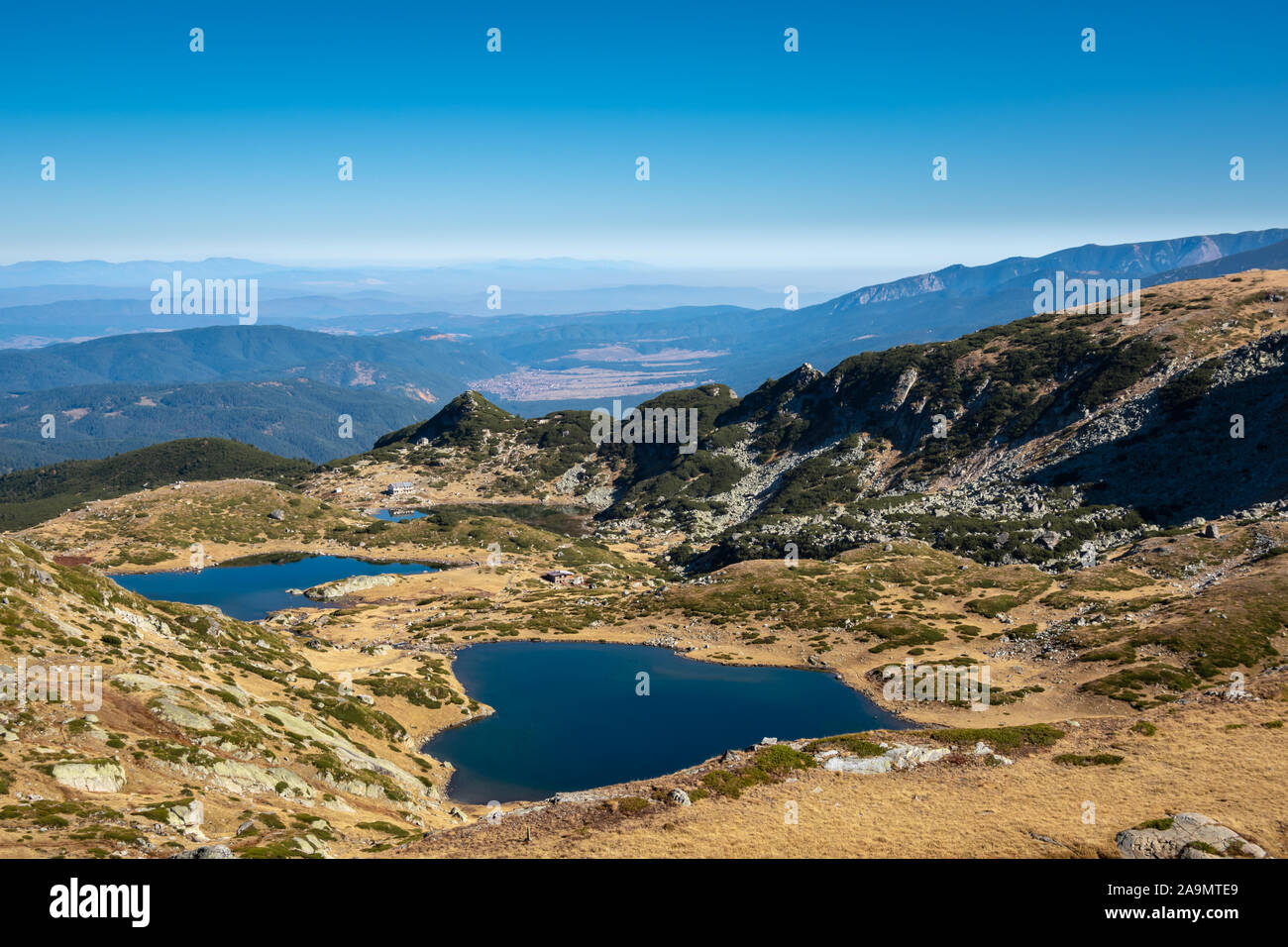 View of the mountain circus with blue glacial lakes. The Seven Rila Lakes, one of the most remarkable natural landmarks on the Balkan Peninsula. Stock Photo