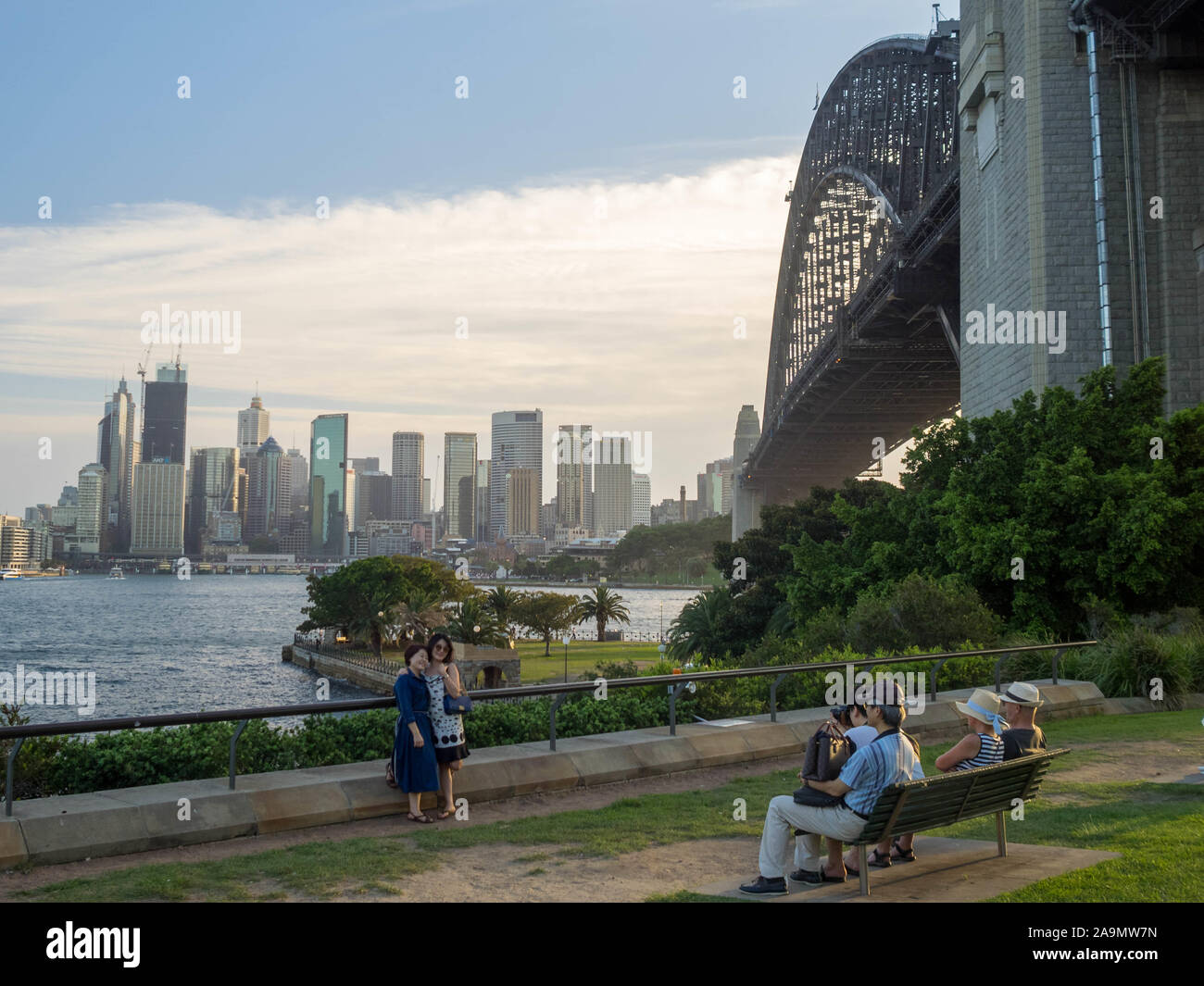 Tourists taking pictures in Milsons Point with Sydney CBD in background Stock Photo
