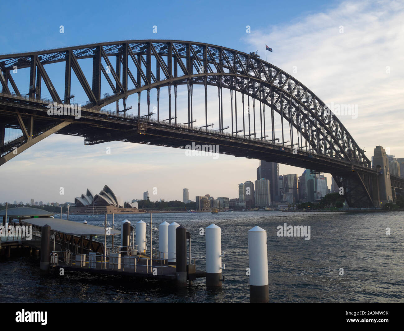 Sydney Harbour Bridge and the cityscape below seen from Milsons Point Stock Photo