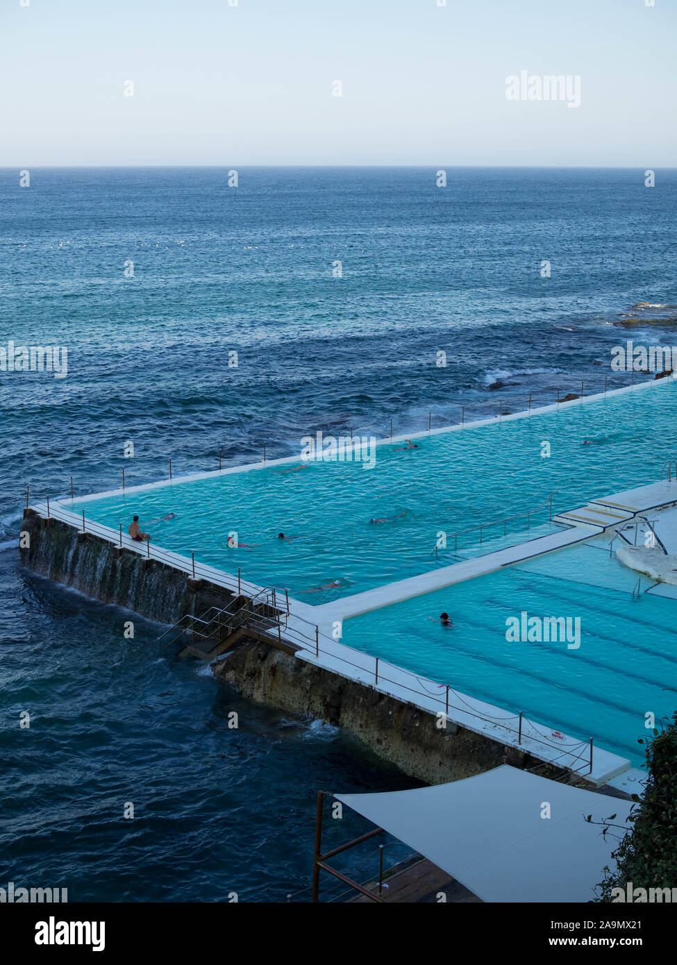 Icebergs Club Swimming Pool at the end of the day Stock Photo