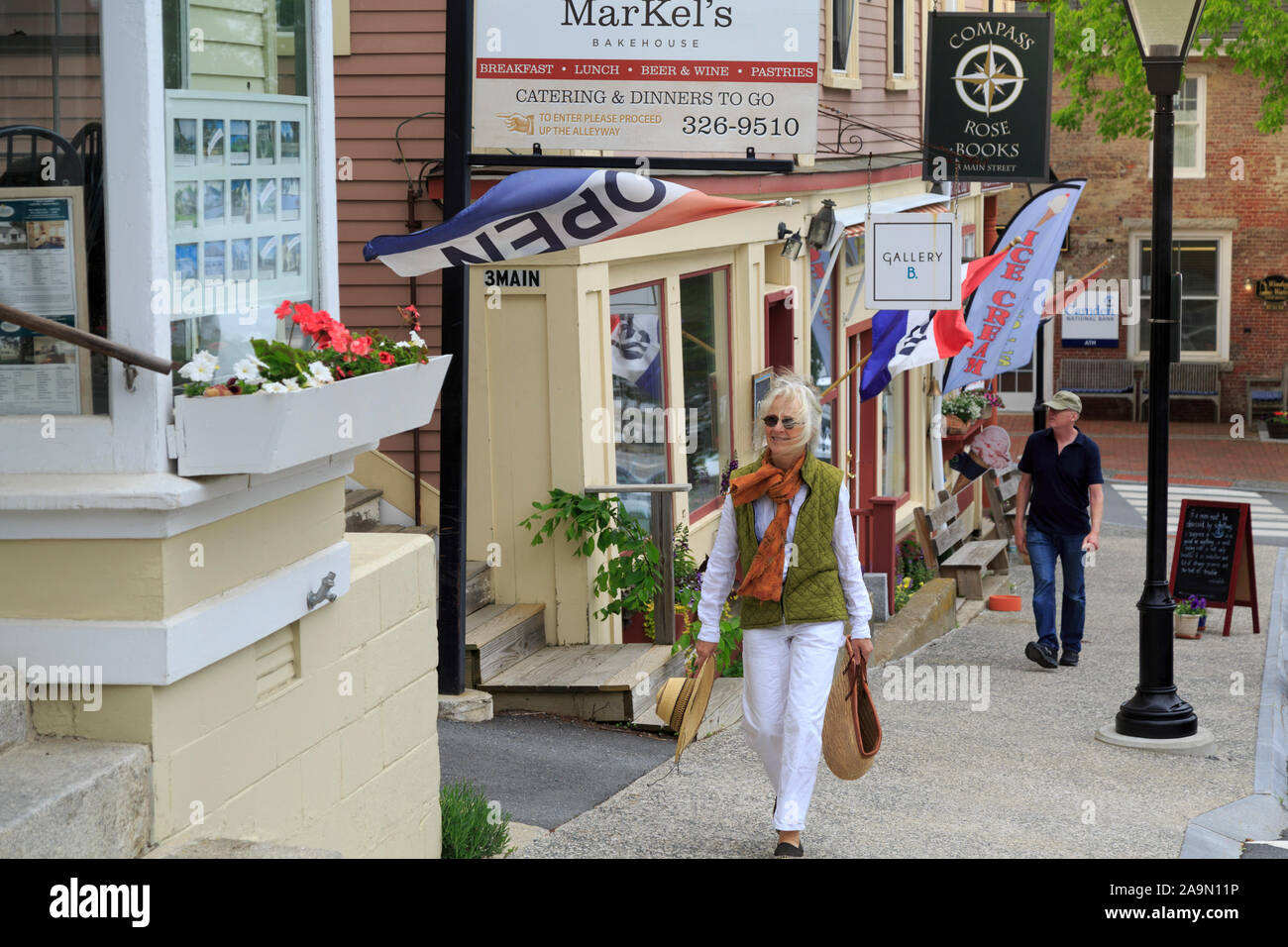 Main Street shops and shoppers in a small New England town, Castine, Maine, USA Stock Photo