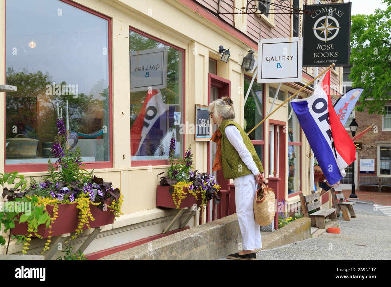 Main Street shops and shoppers in a small New England town, Castine, Maine, USA Stock Photo