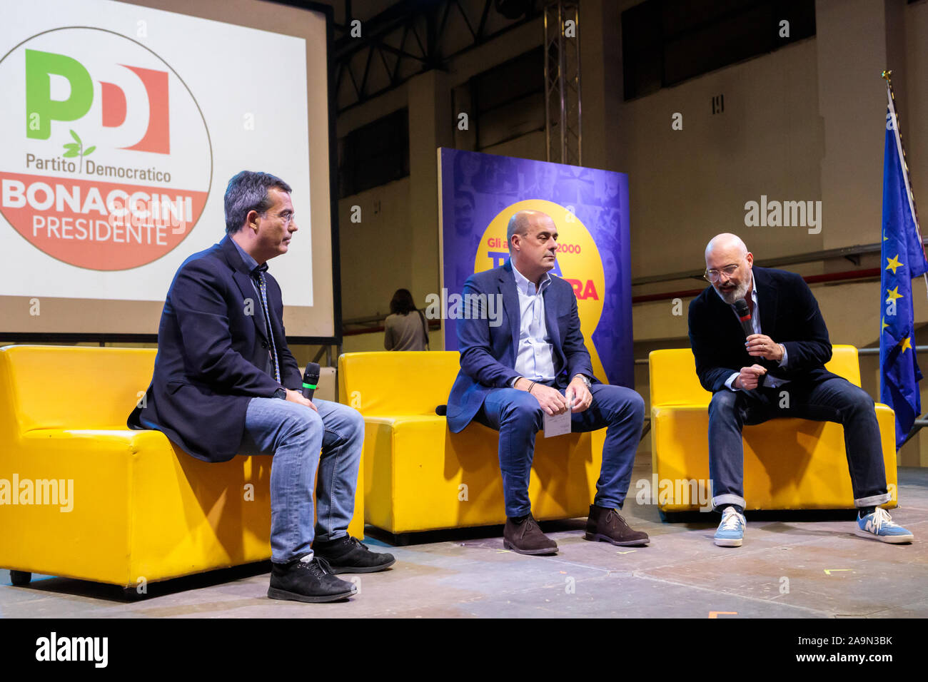 Bologna, ITALY. 16 November, 2019. Nicola Zingaretti (C), National Secretary of the Italian Democratic Party (PD), on stage with Stefano Bonaccini (R), Democratic candidate for the presidency of the Emilia-Romagna region and the journalist Giovanni Floris (L) on November 16, 2019 in Bologna, Italy. Credit: Massimiliano Donati/Alamy Live News Stock Photo