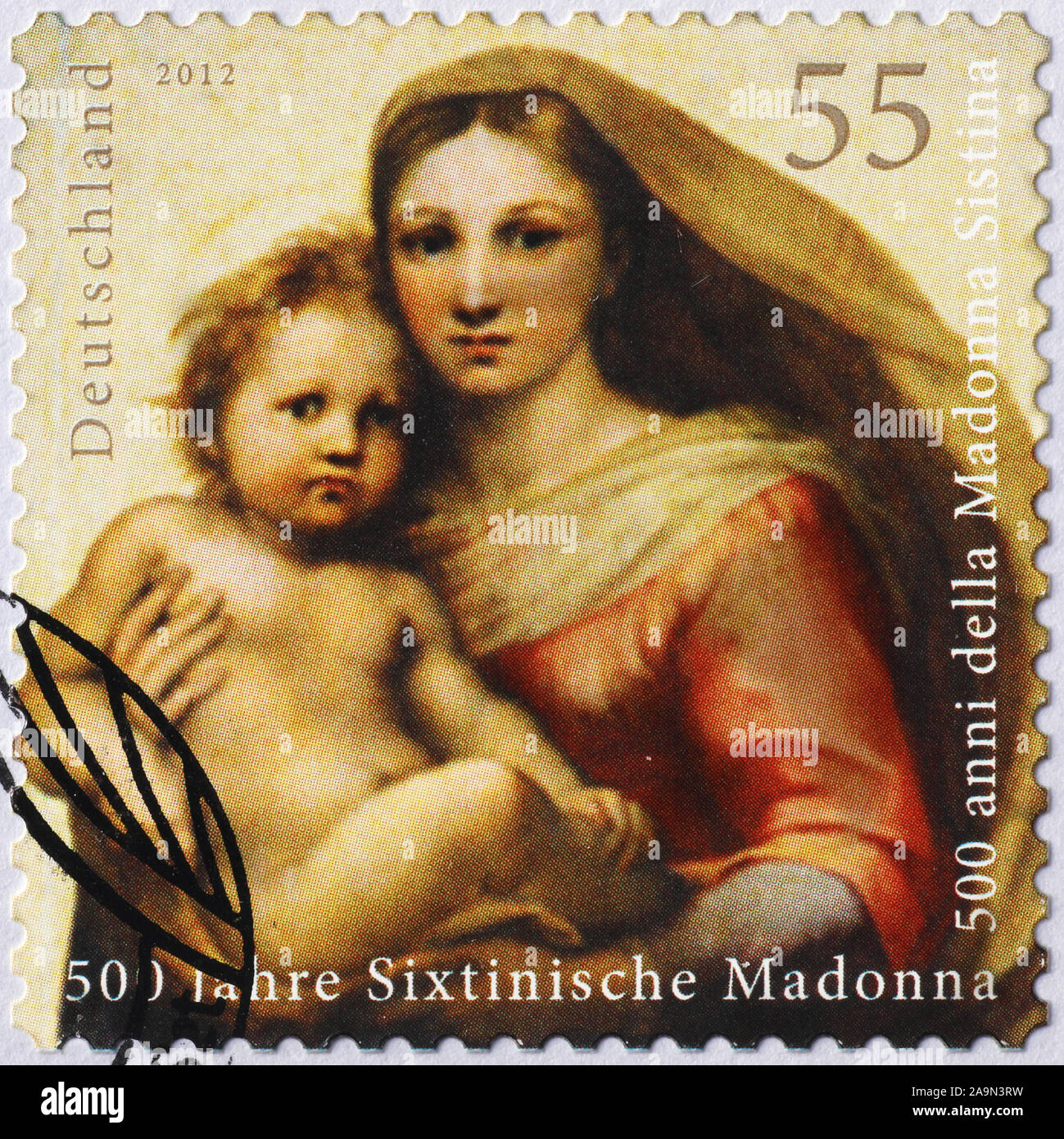 Sistine Madonna and Jesus by Raphael on postage stamp Stock Photo